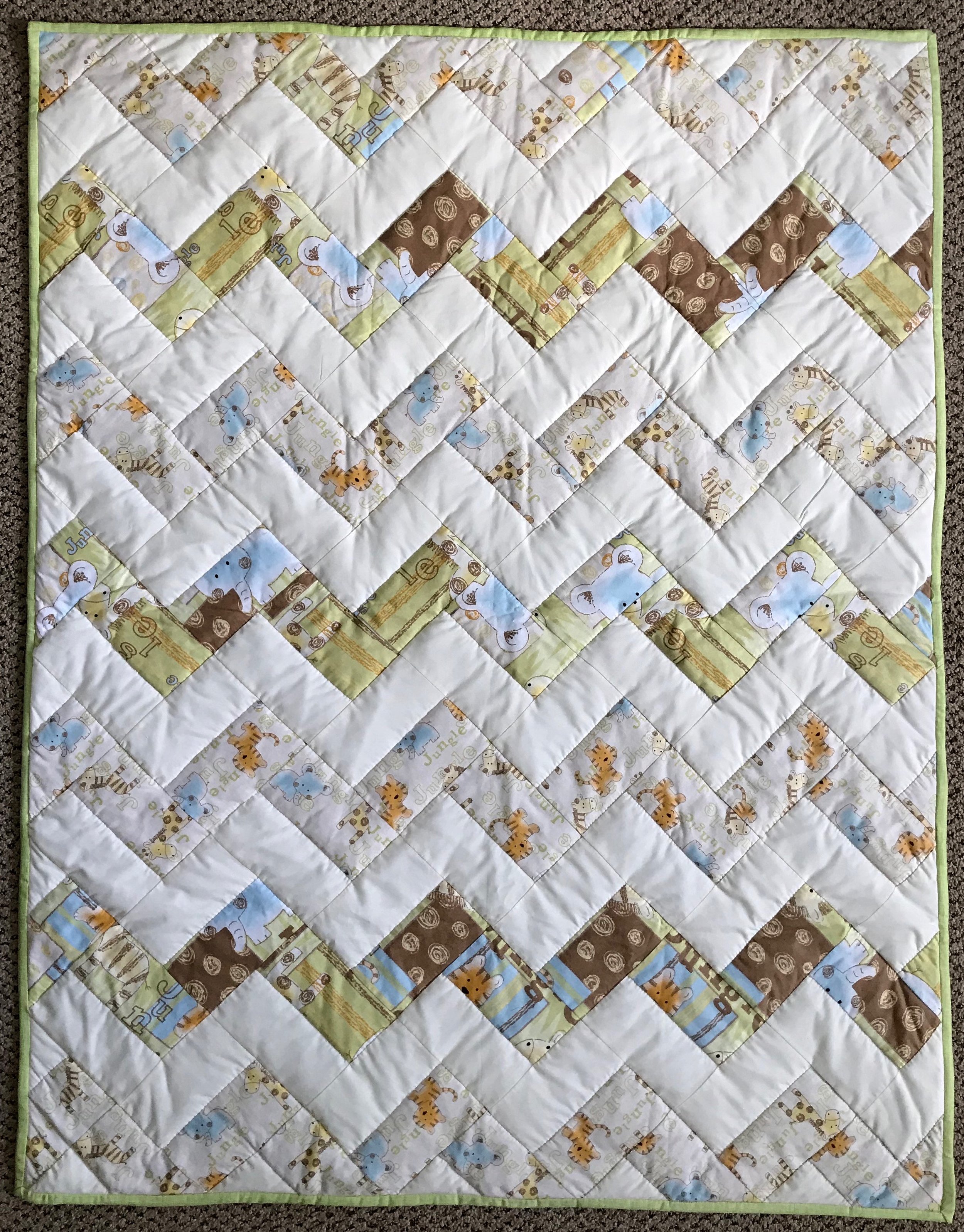 Jungle Paths, Pieced, Hand Quilted, donated by Holdeman Mennonite Church, 36 x 46”