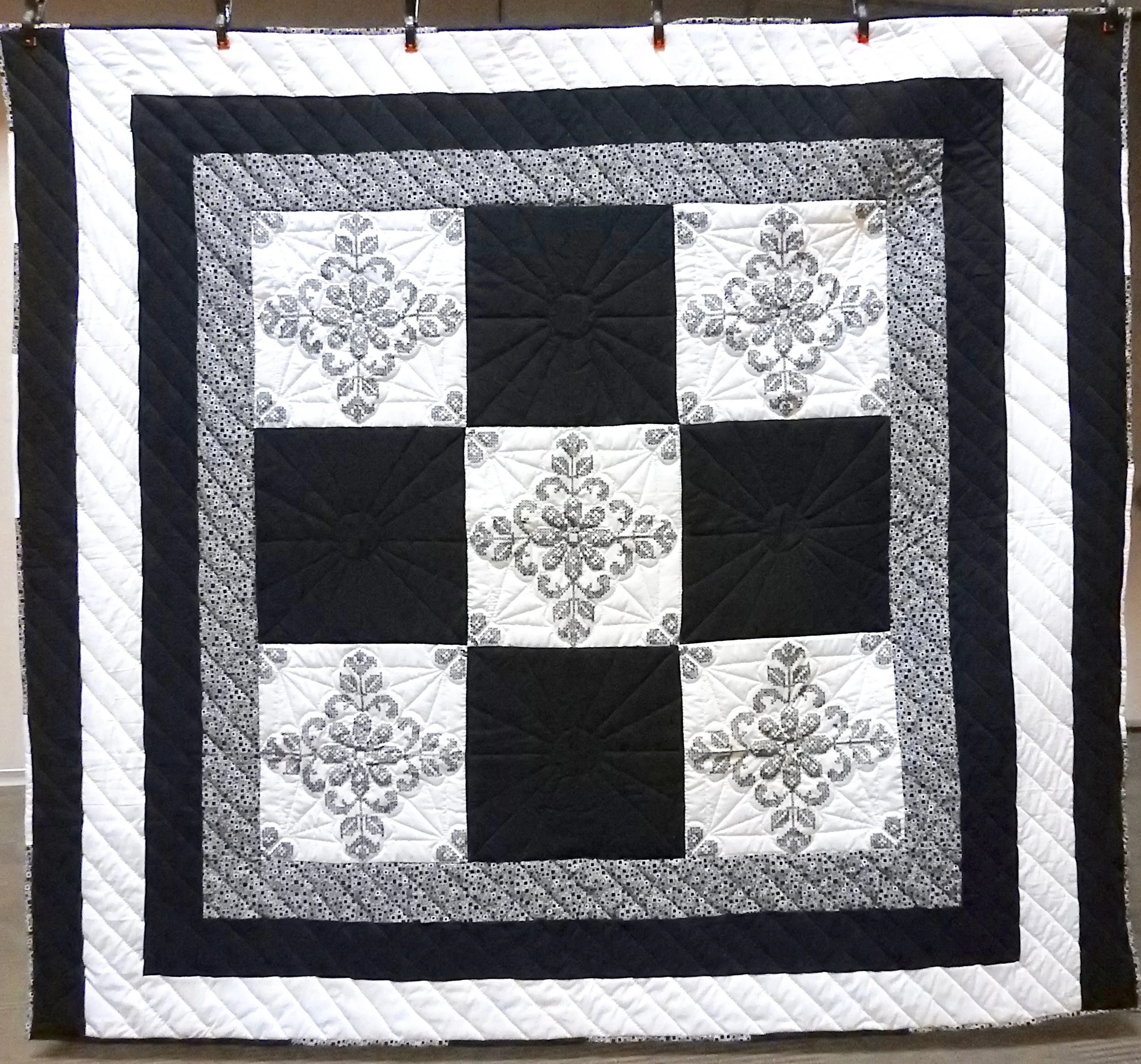 Midnight Sun, Pieced, Embroidered, Hand Quilted, donated by First Mennonite, Middlebury, 72 x 83”
