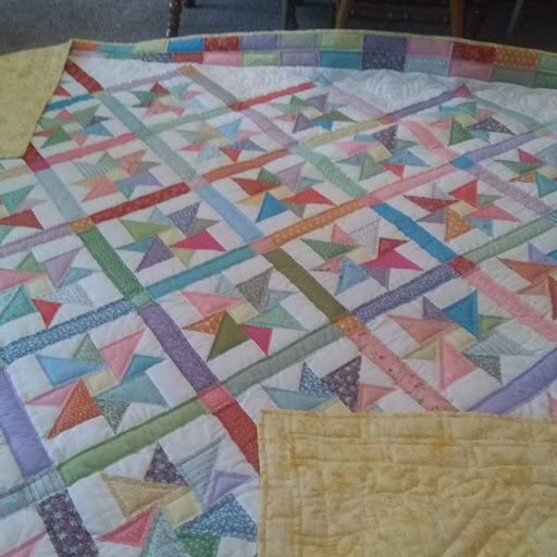  Pinwheel Star, Pieced, Hand Quilted, donated by Riverview Christian Fellowship, 95 x 113”