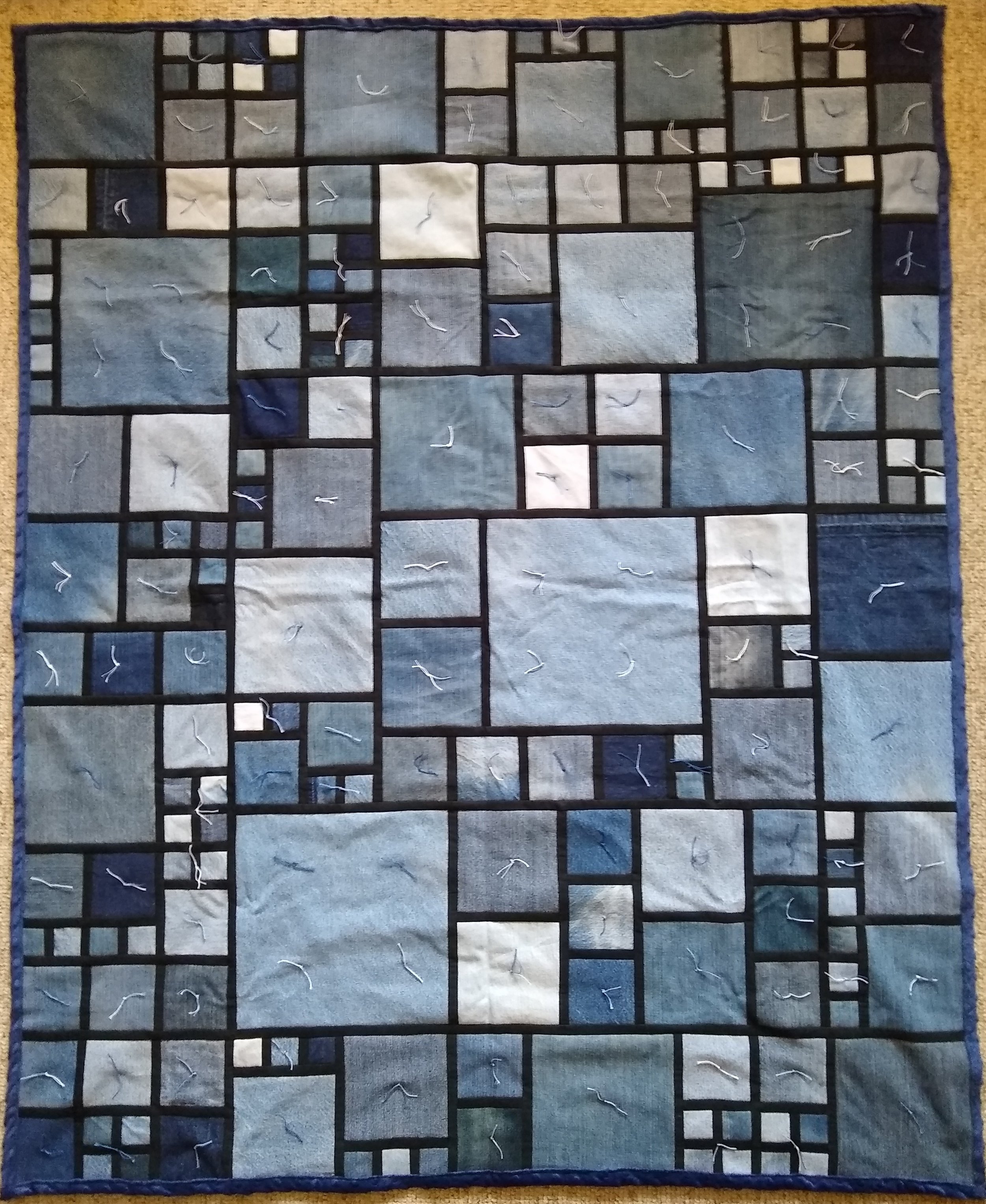 Stained Glass Denim Comforter, Pieced &amp; Knotted, donated anonymously, 53 x 64”