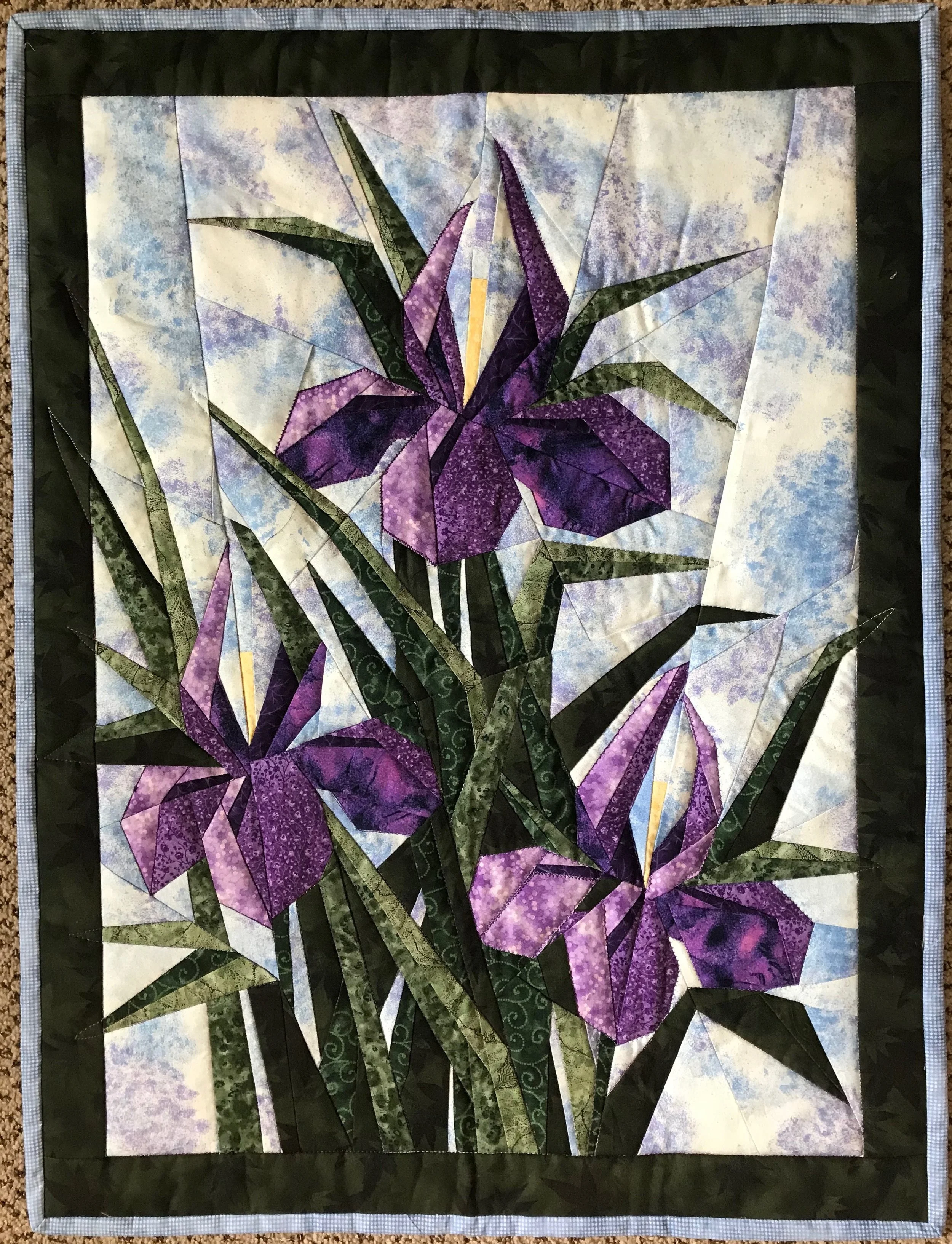 Three Iris Flowers, Pieced, Machine Appliquéd & Quilted, donated anonymously, 21 x 29”