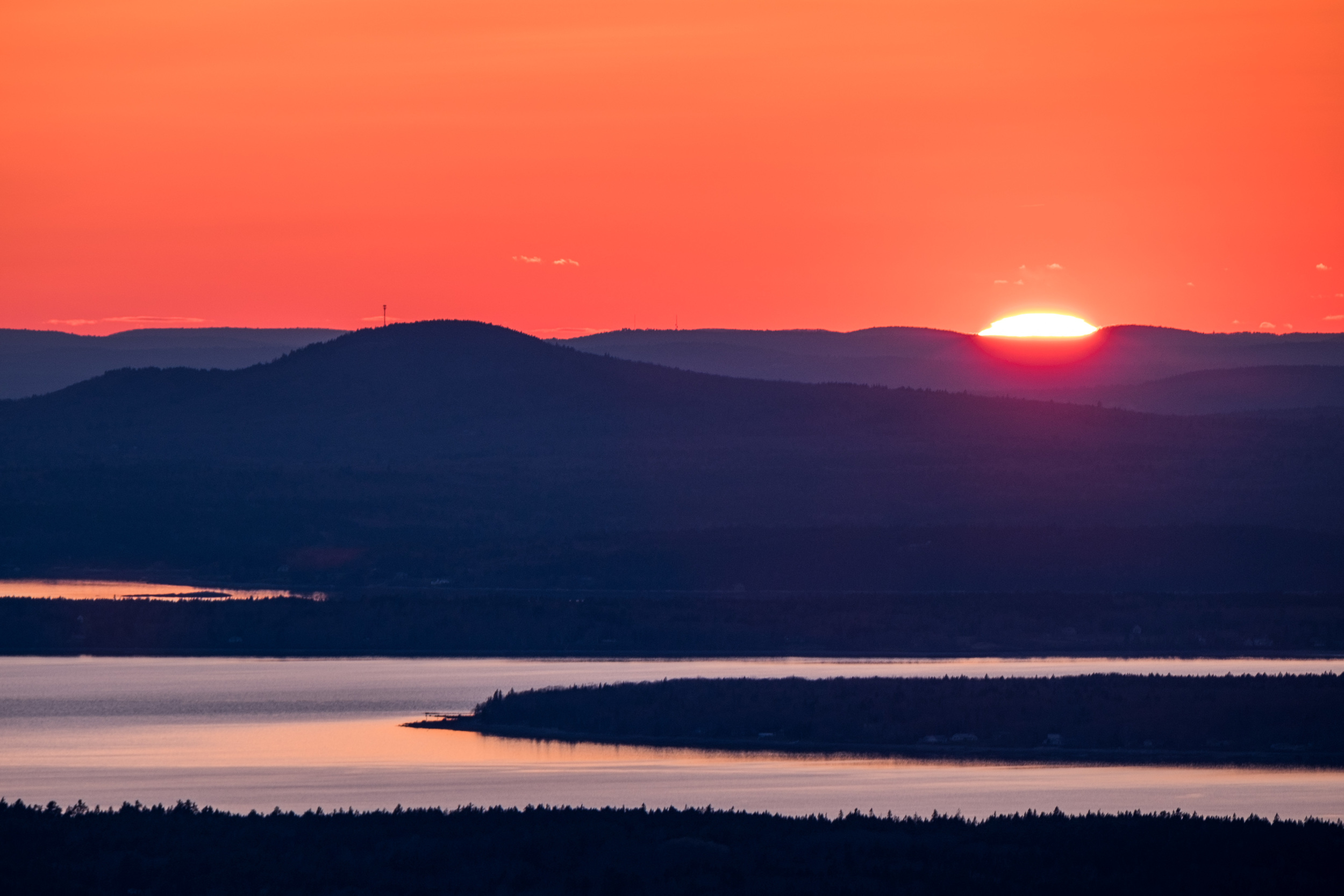 Sunset view from atop Cadillac Mountain. This is the location from where the United States is lit with its first rays of sunlight each day. 