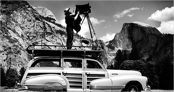 A famous photo circa 1942 of Ansel Adams photographing Yosemite National Park with a full format camera. ( Image courtesy of the Cedric Wright Family via The New York Times .) 