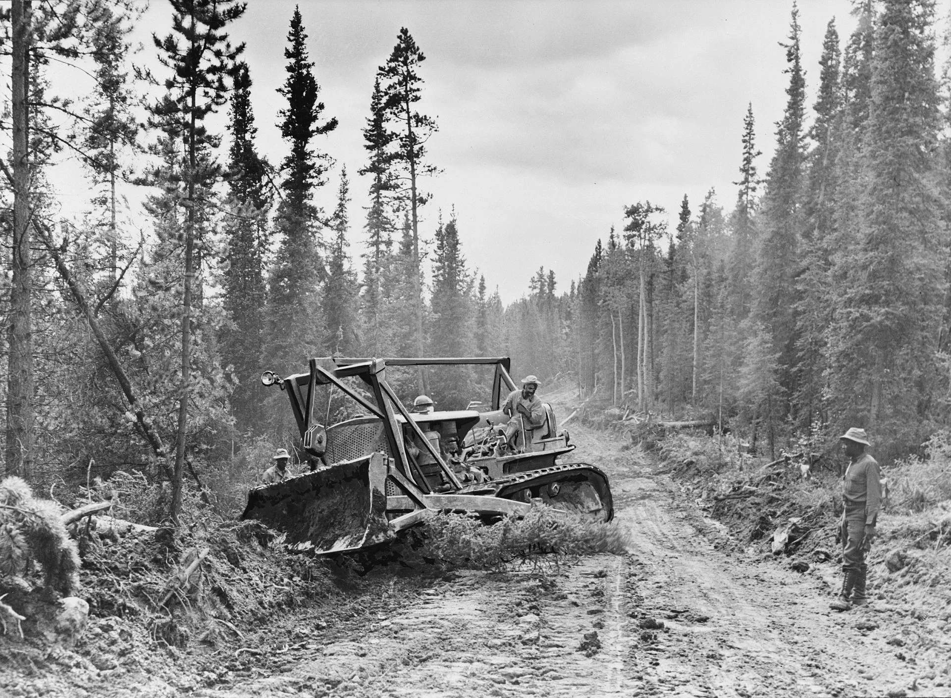 The roadway is widened in 1942 with a caterpillar tractor. Credit: Wikipedia.