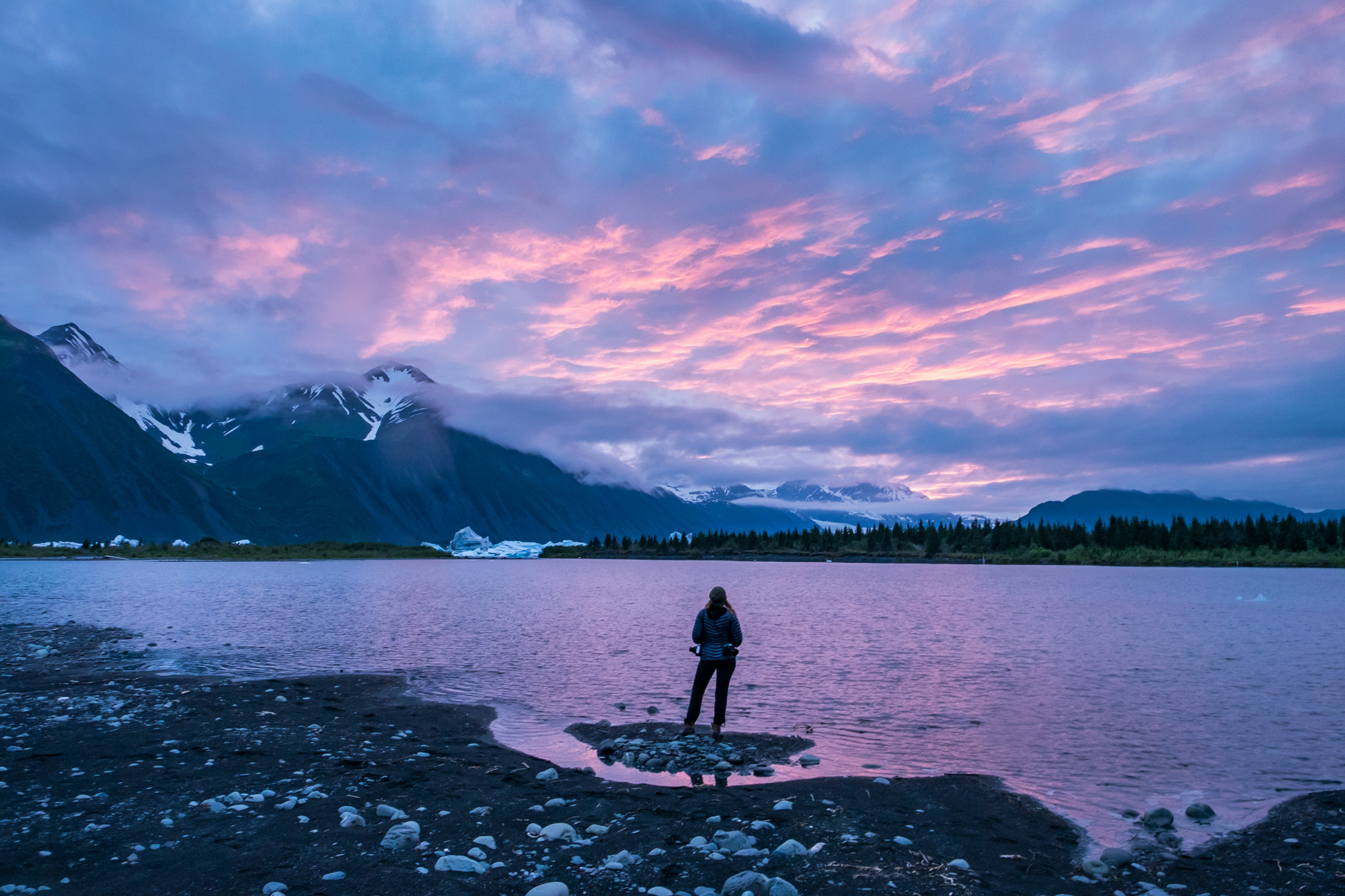 A rare pink sky explodes at night near Bear Glacier in the Kenai Fjords, just following dinner and a long day of paddling through icebergs. This entire experience was surreal, challenging, eye-opening, and totally awesome. 