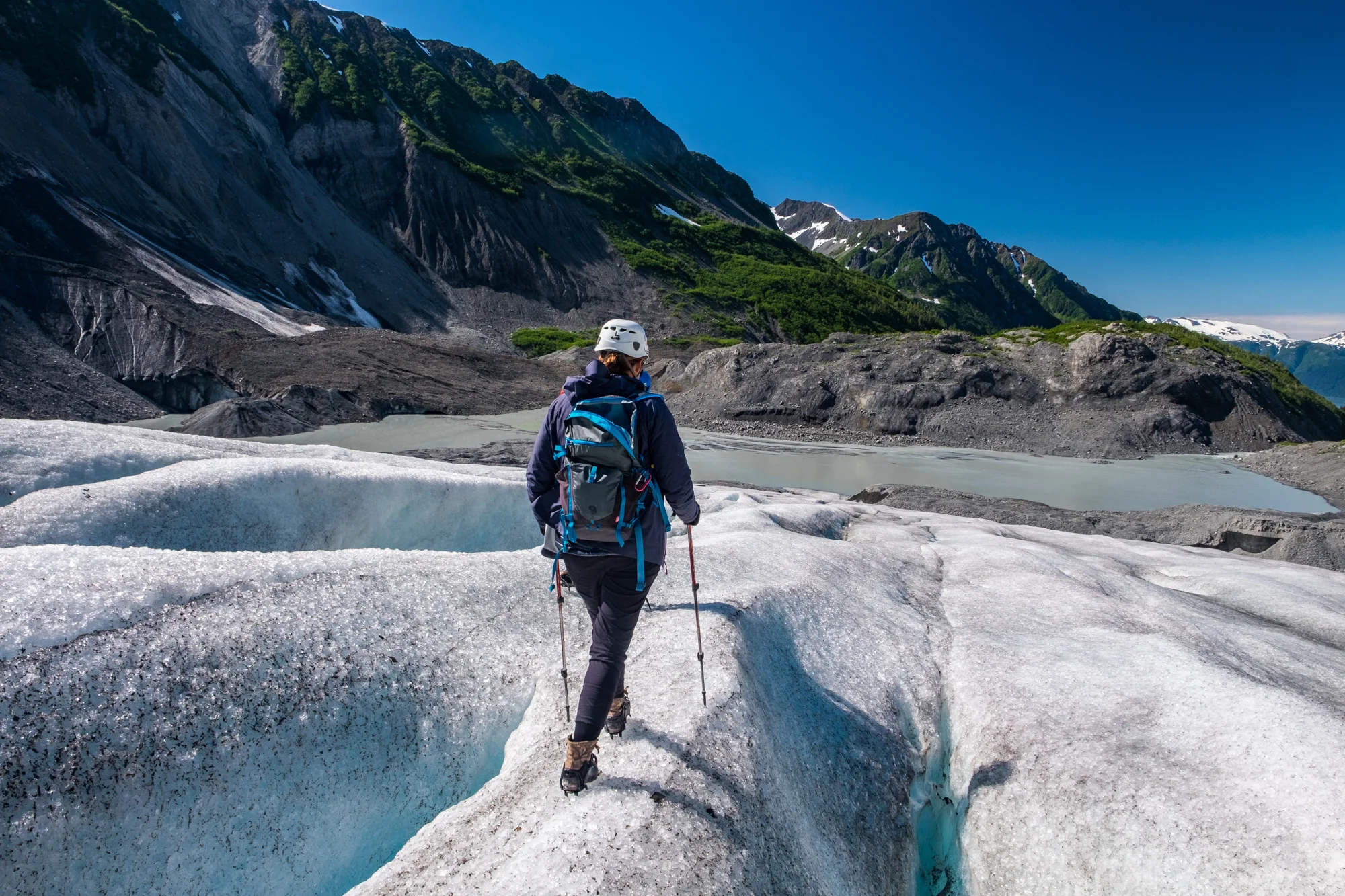 Stef forges atop the Godwin Glacier, emphatically avoiding moulins and crevasses , while gaining some knowledge that would turn out to become important in future glacier exploration...