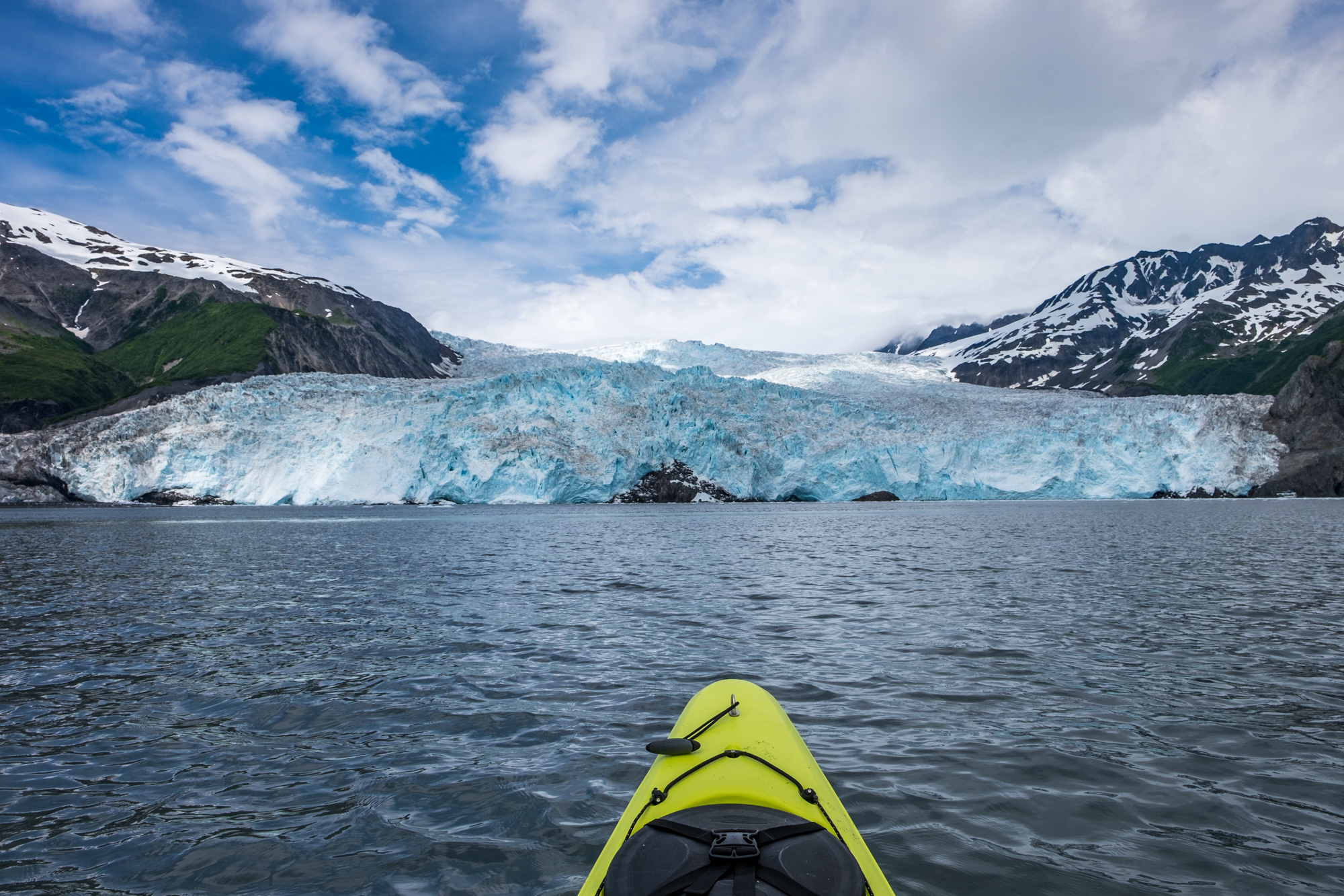 Heading toward the Aialik Glacier on a memorable day paddle that brought us near wildlife, geological formations, and to an active glacier that took our breath away each time it loudly dropped a piece of ice into the bay. 