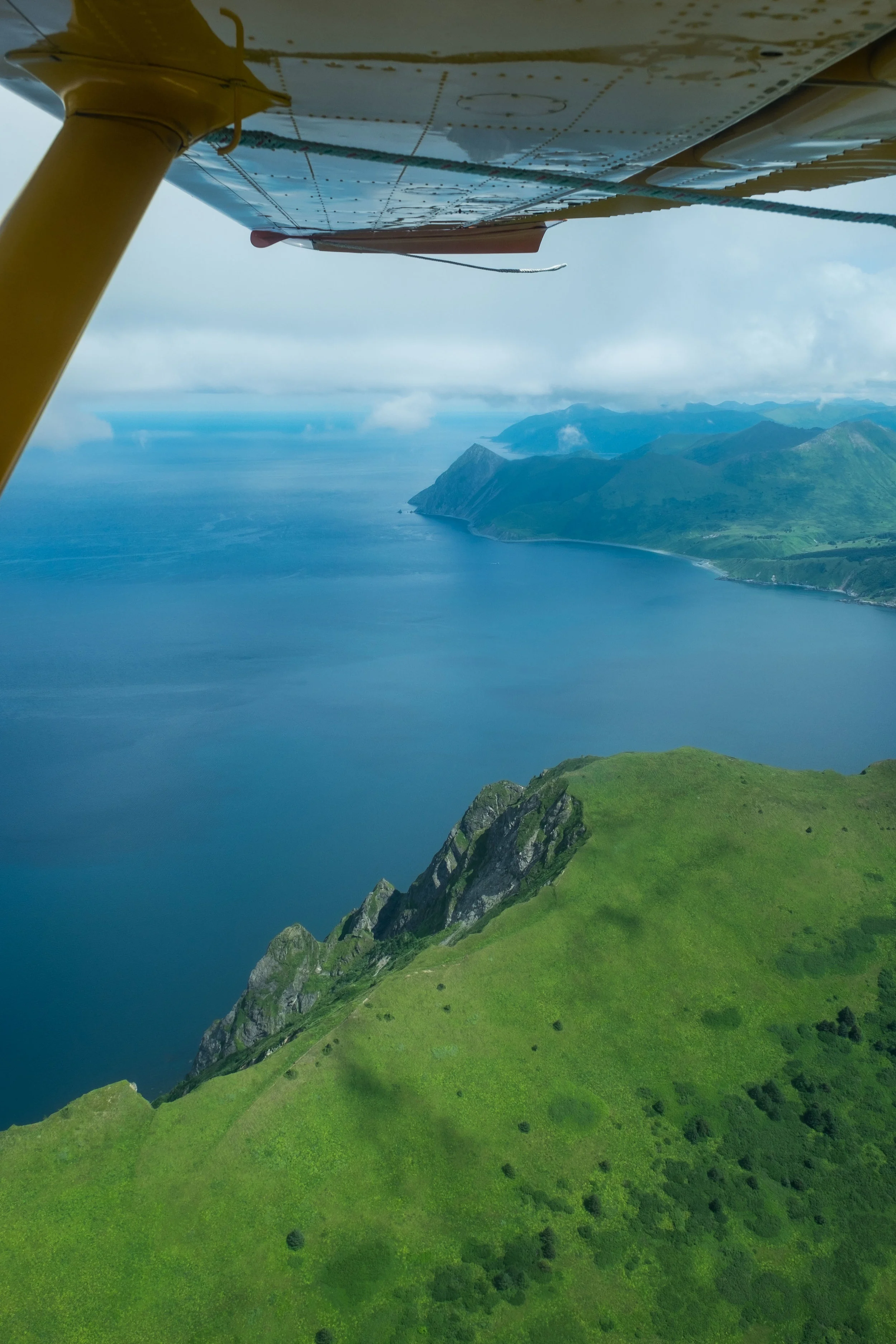 A flightseeing tour of Katmai will absolutely take your breath away. Pictured here is the Katmai Peninsula as seen aboard a flight with Andrews Airways on our way out of the Shelikof Straight.