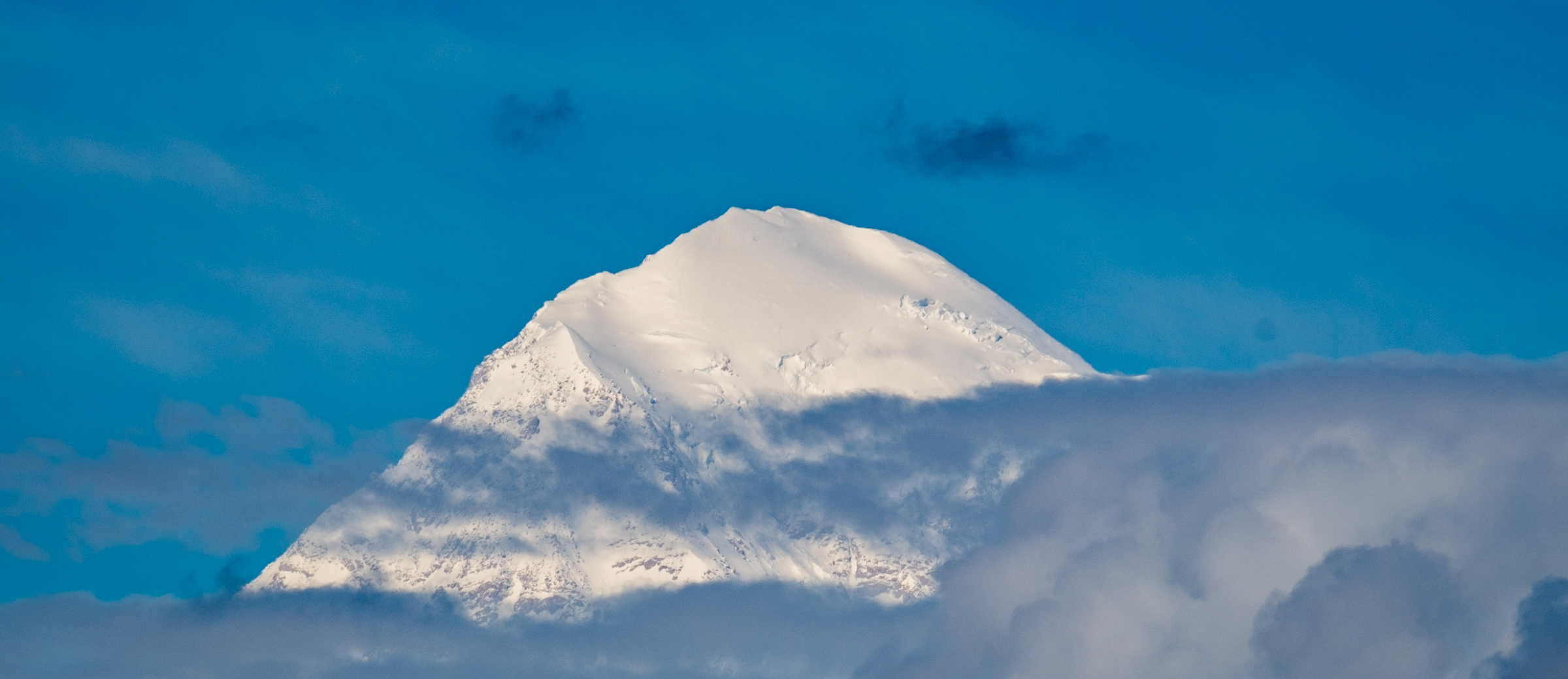 Denali, meaning "The High One" or "The Great One" in native Athabscan, is the highest peak in North America, standing at 20,320 feet above sea level.