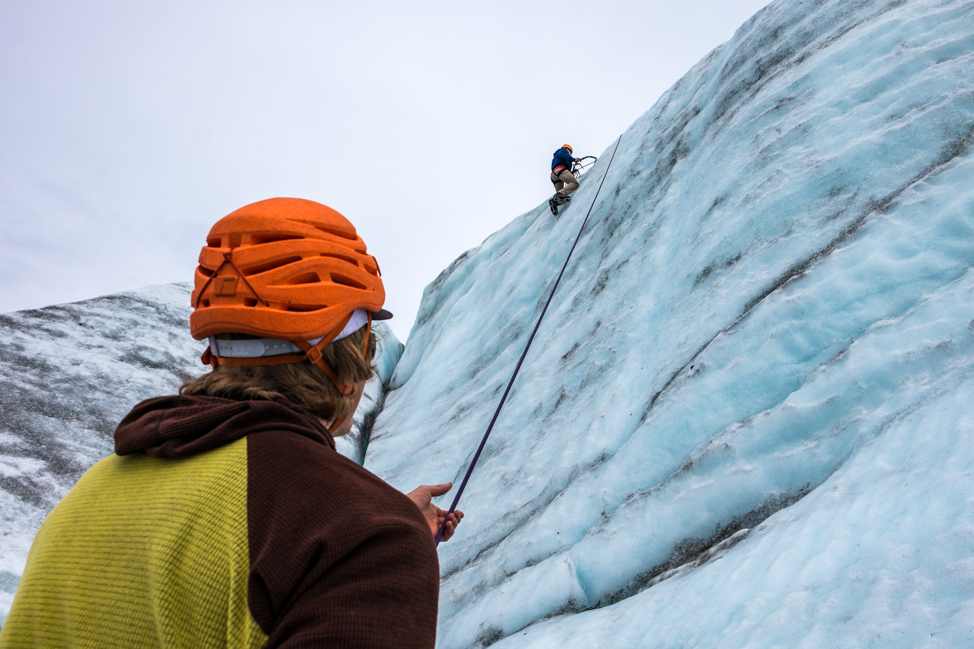 Derek, one of the experienced guides and wizard climbers with St. Elias Guides, kept us safe with a belay while ice climbing a 70-foot wall. 