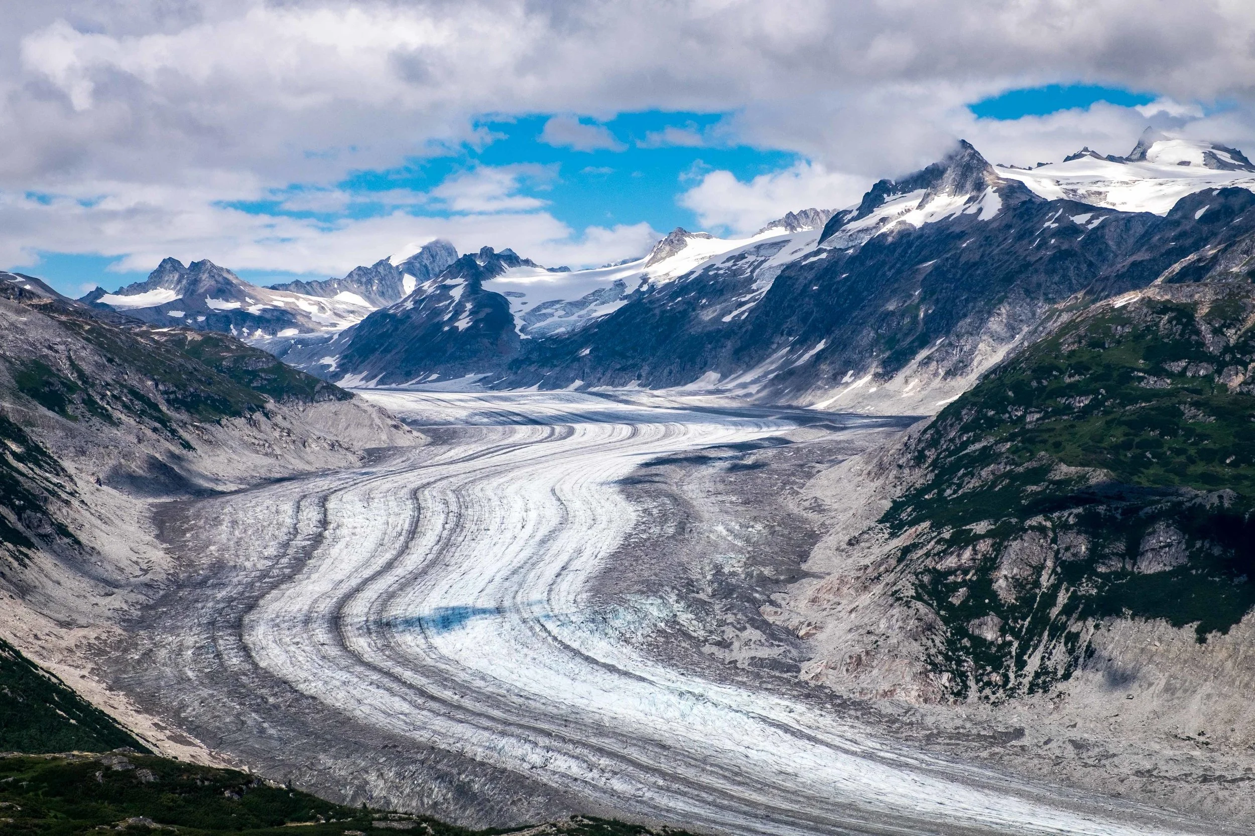 Flying over glacier and through mountains on the way to Lake Clark. Just another gorgeous day in Alaska!