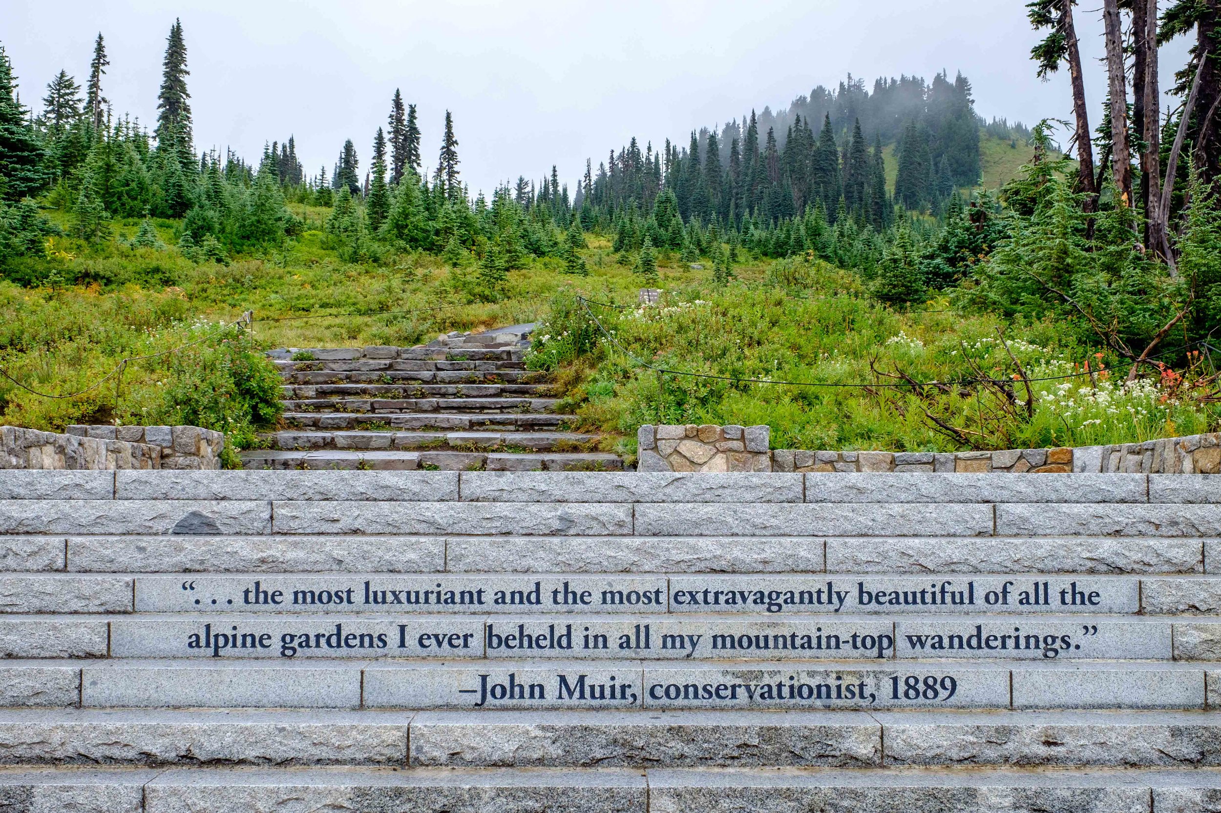 The entrance to Skyline Trail from the steps leading away from the Paradise Jackson Visitor Center is commemorated by touching words by John Muir.