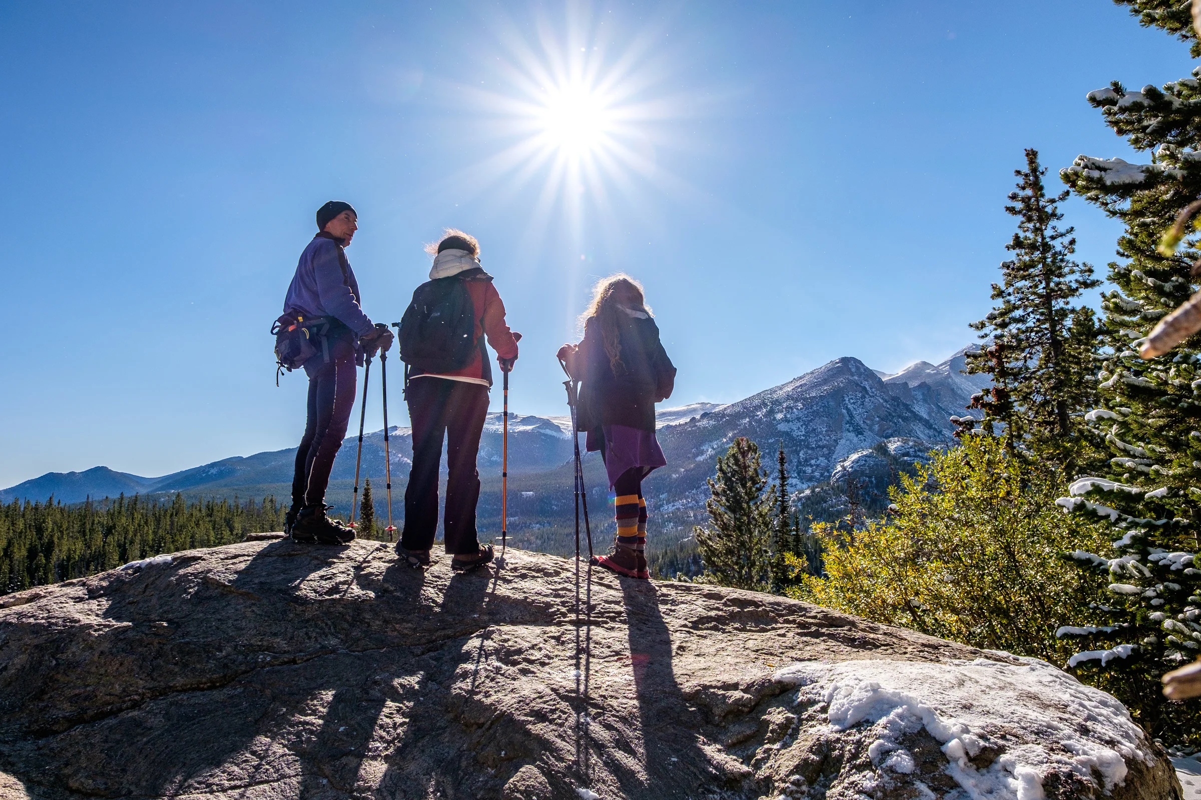 Friends gather at an overlook on the way to Dream Lake.