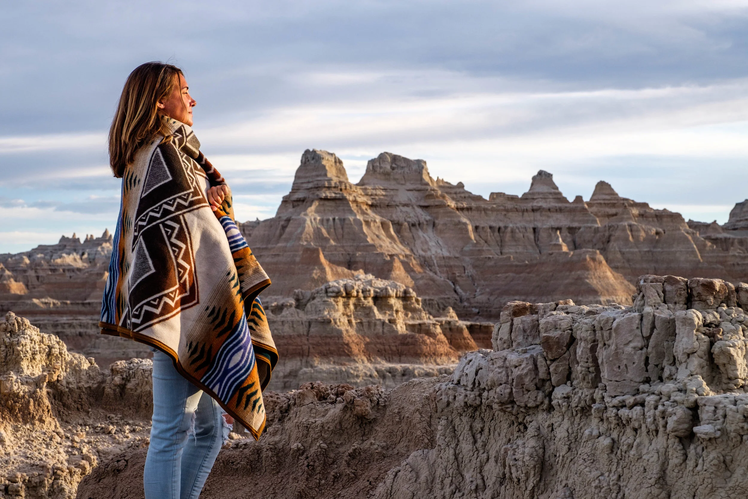 Stefanie, with a small Lakota bloodline, looks out upon the badlands in her paternal grandmother's home state. "I've never felt so connected to my family history," she said. 