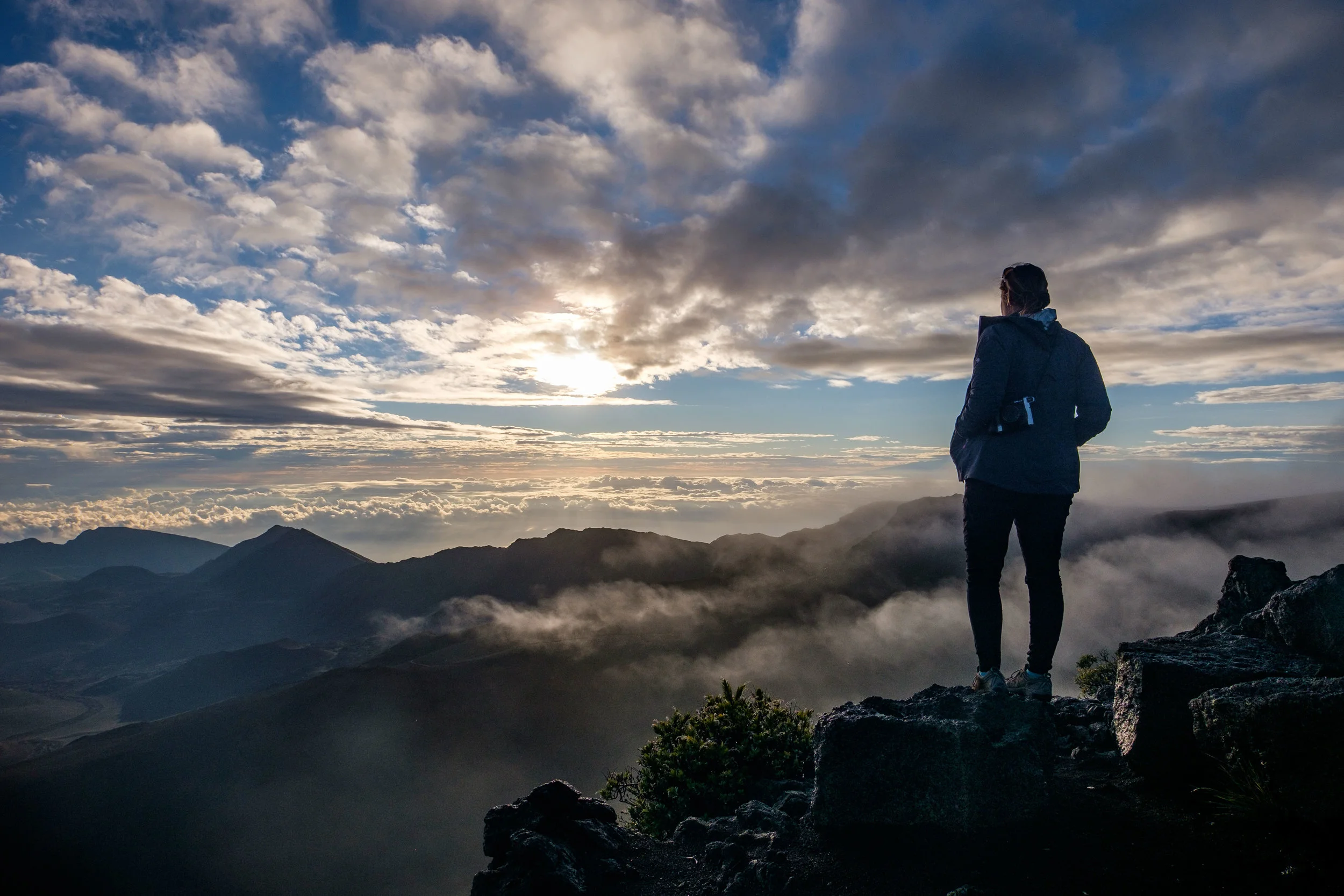 Standing atop the Haleakala Crater in Haleakala National Park on the island of Maui, Islands of Hawai'i. Shot with FUJIFILM X-T1.