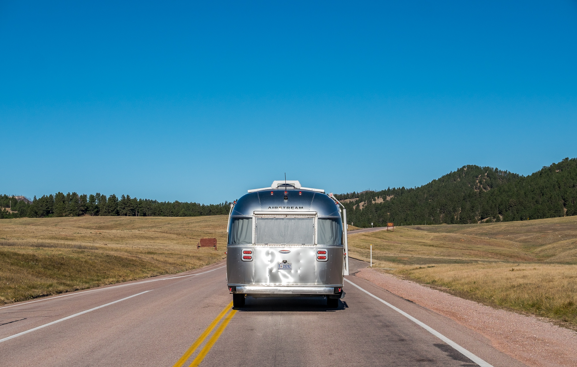 Wally the Airstream in his element driving through Wind Cave National Park in South Dakota!