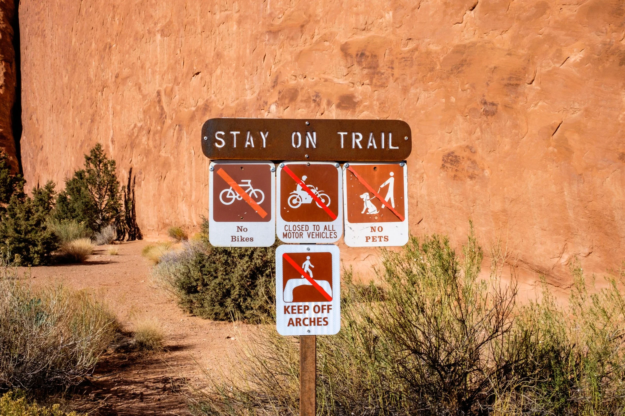 There are more than enough reminders throughout the park to stay on the trail!