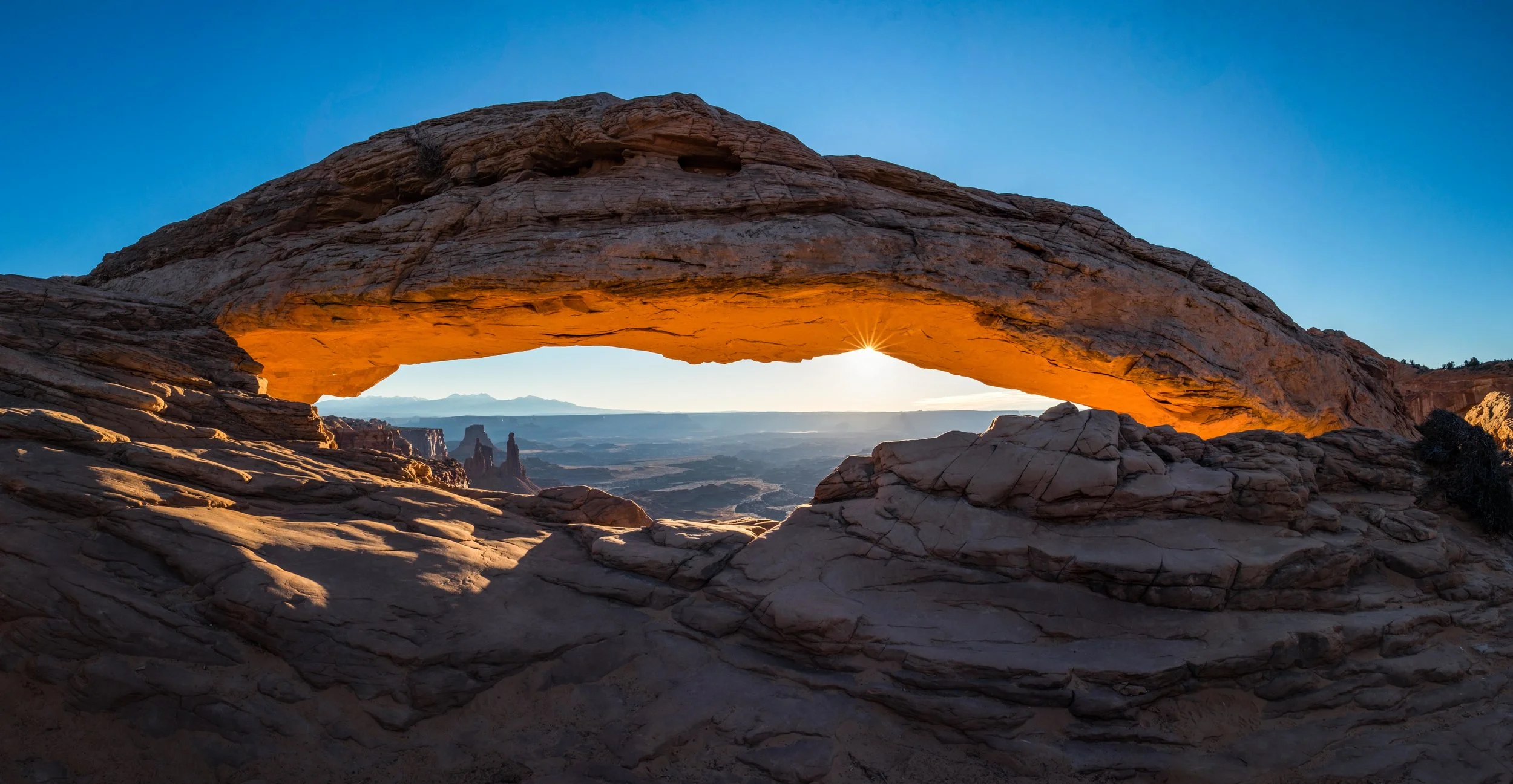 Mesa Arch – it literally glows at sunrise. 