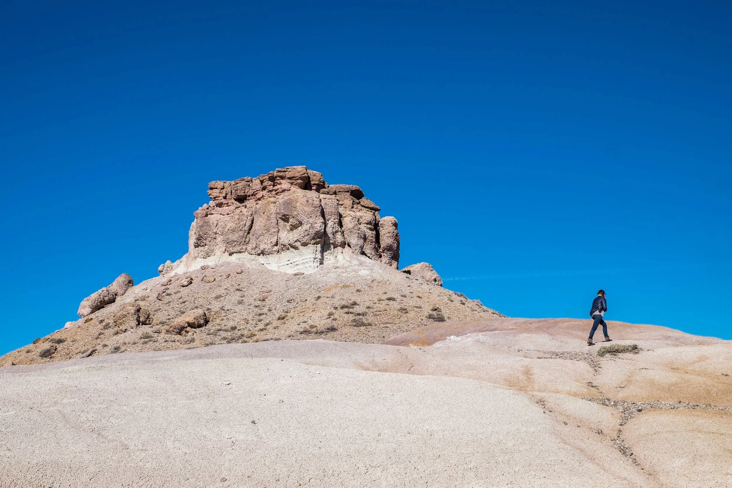 Hiking atop badland formations on the outskirts of the Cathedral Valley area.
