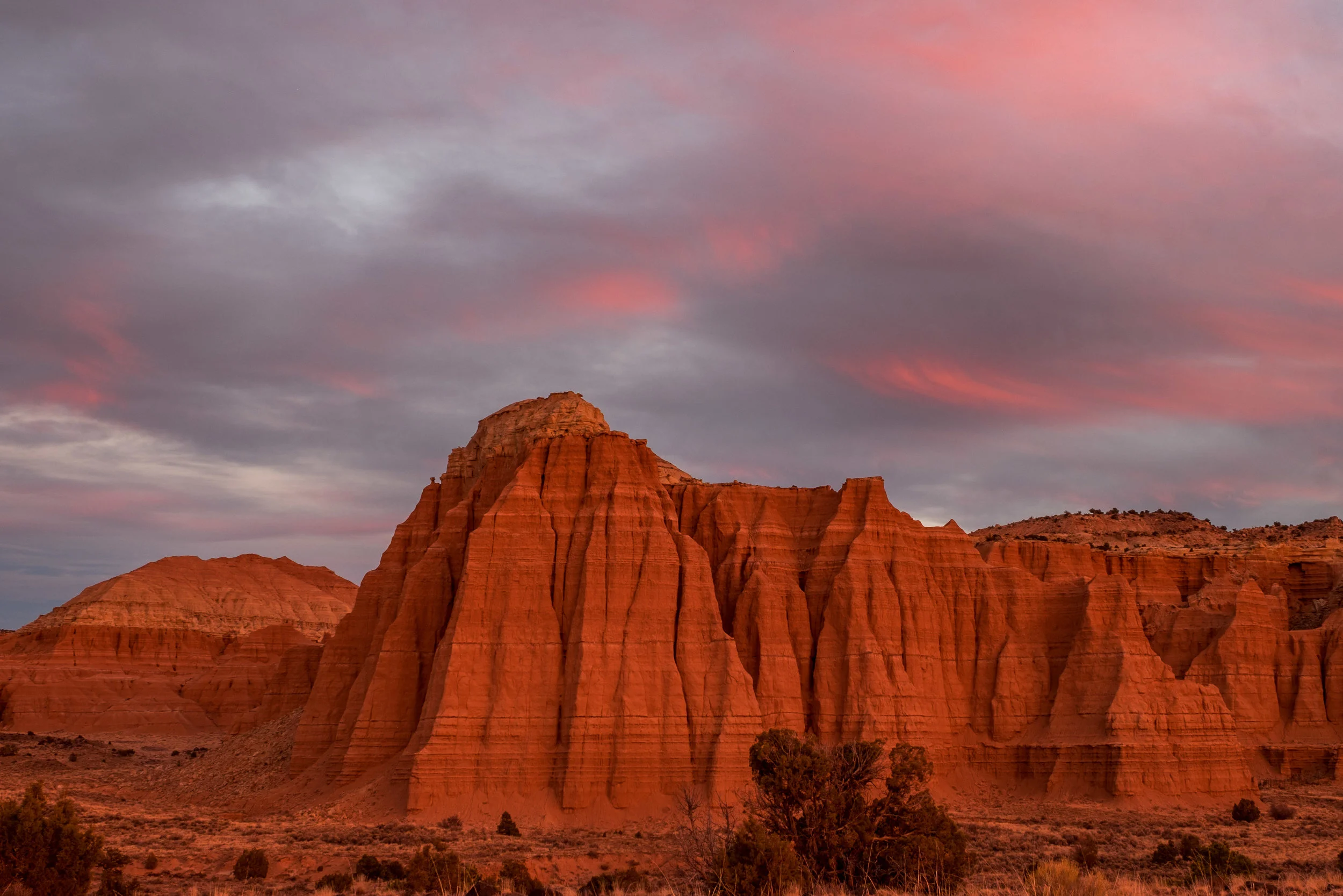 Red rock in the crepescule of a richly colored November night. 