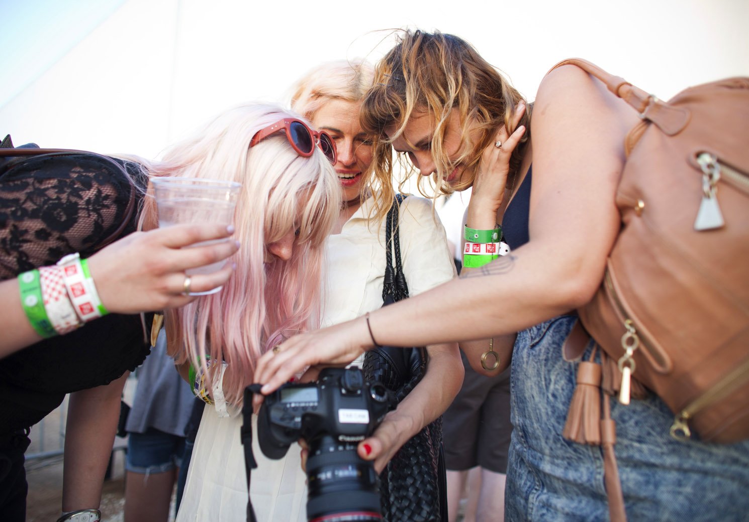 Random Girls looking at camera technology Clayton Hauck Austin hipsters.jpg