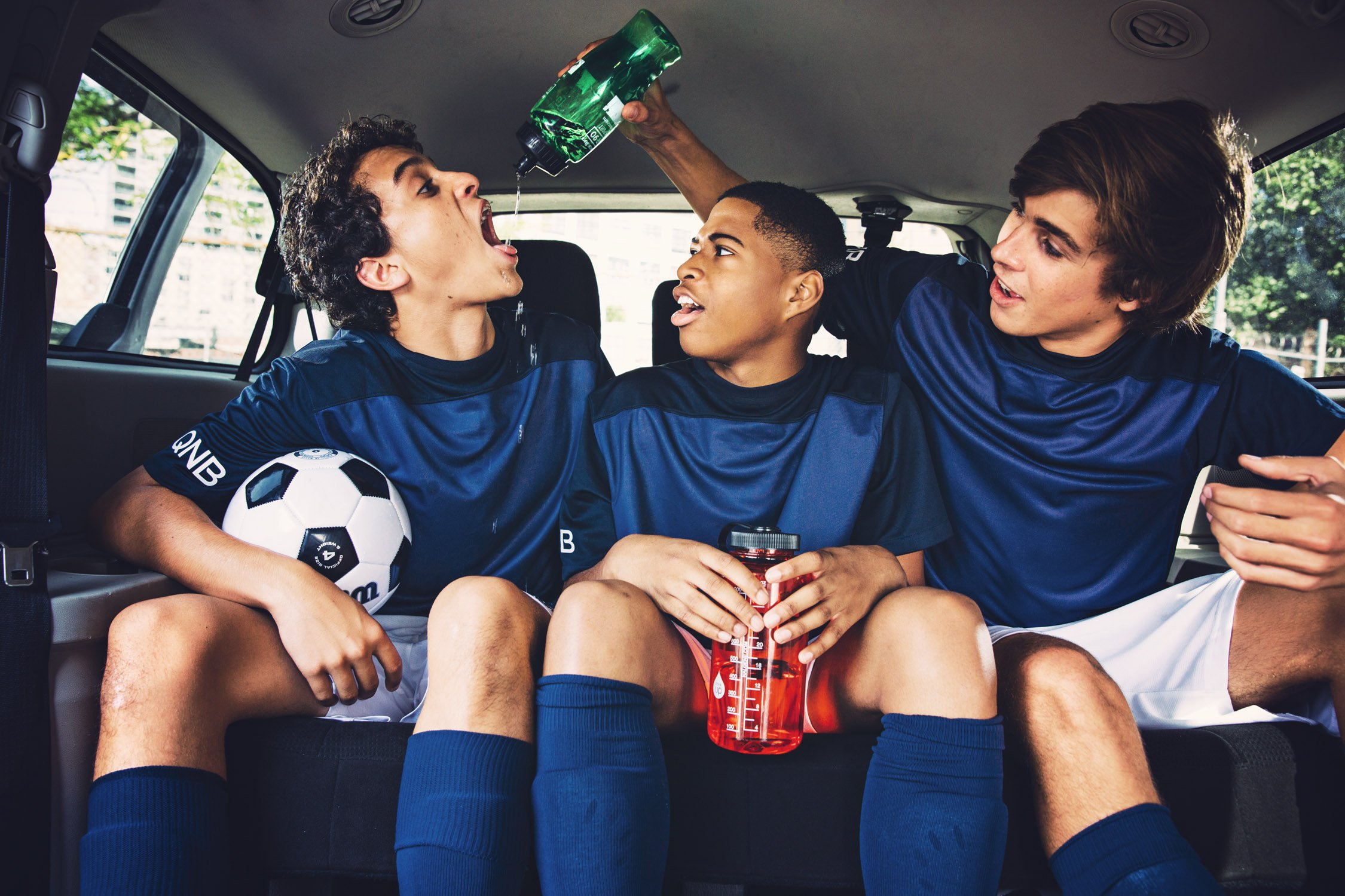 CommercialTr kids in car drinking water 6017.jpg