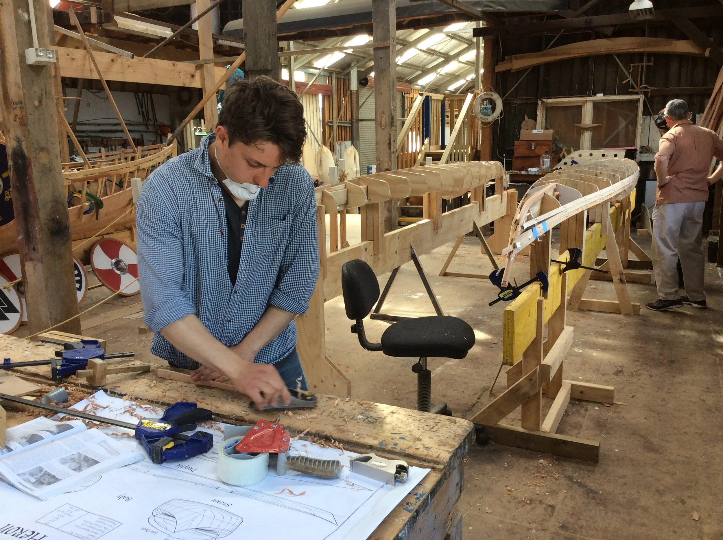 Christian fitting infill planks to a strip planked kayak