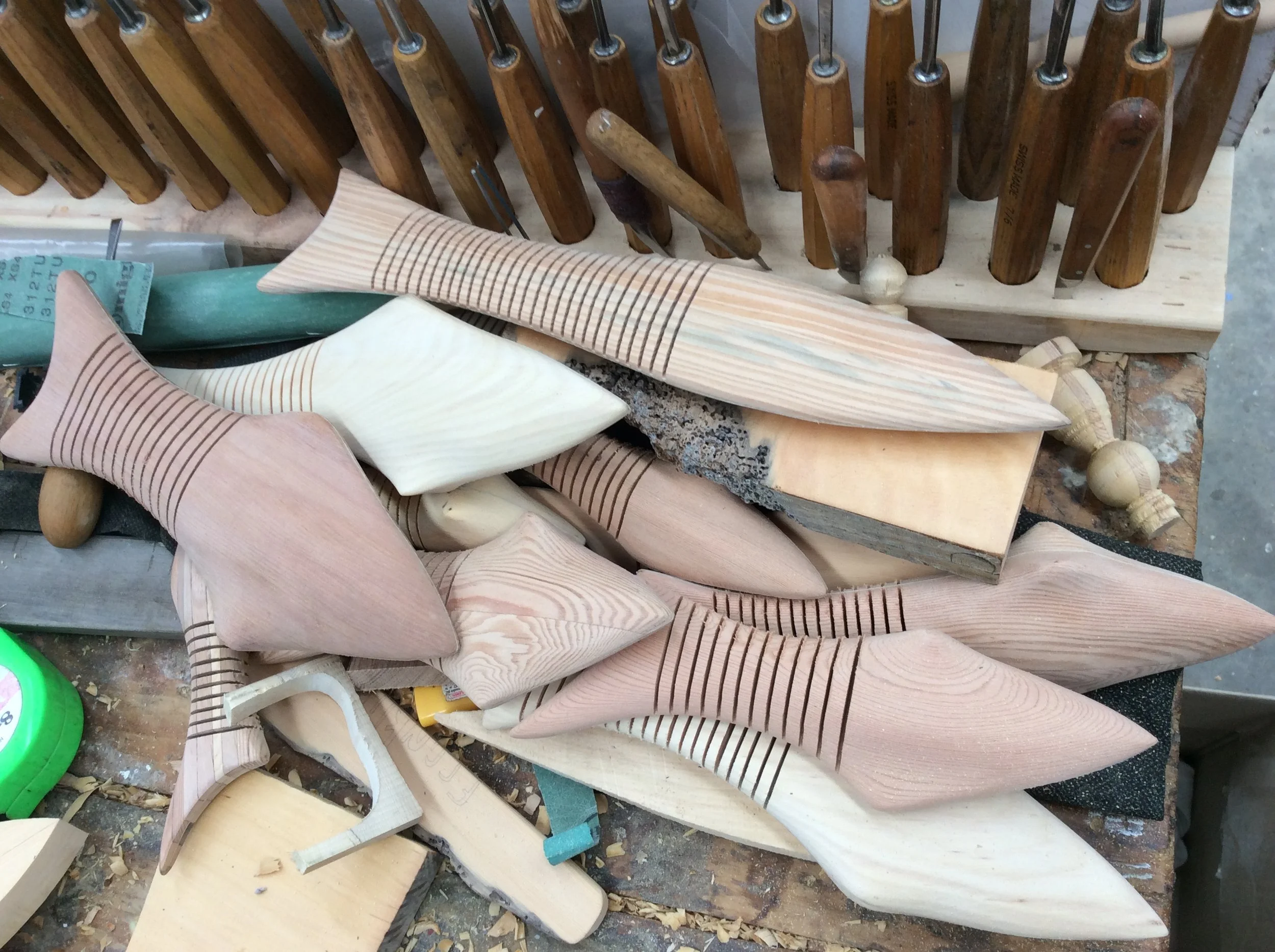 A pile of fish - Souvenirs made from scrap boat building timbers