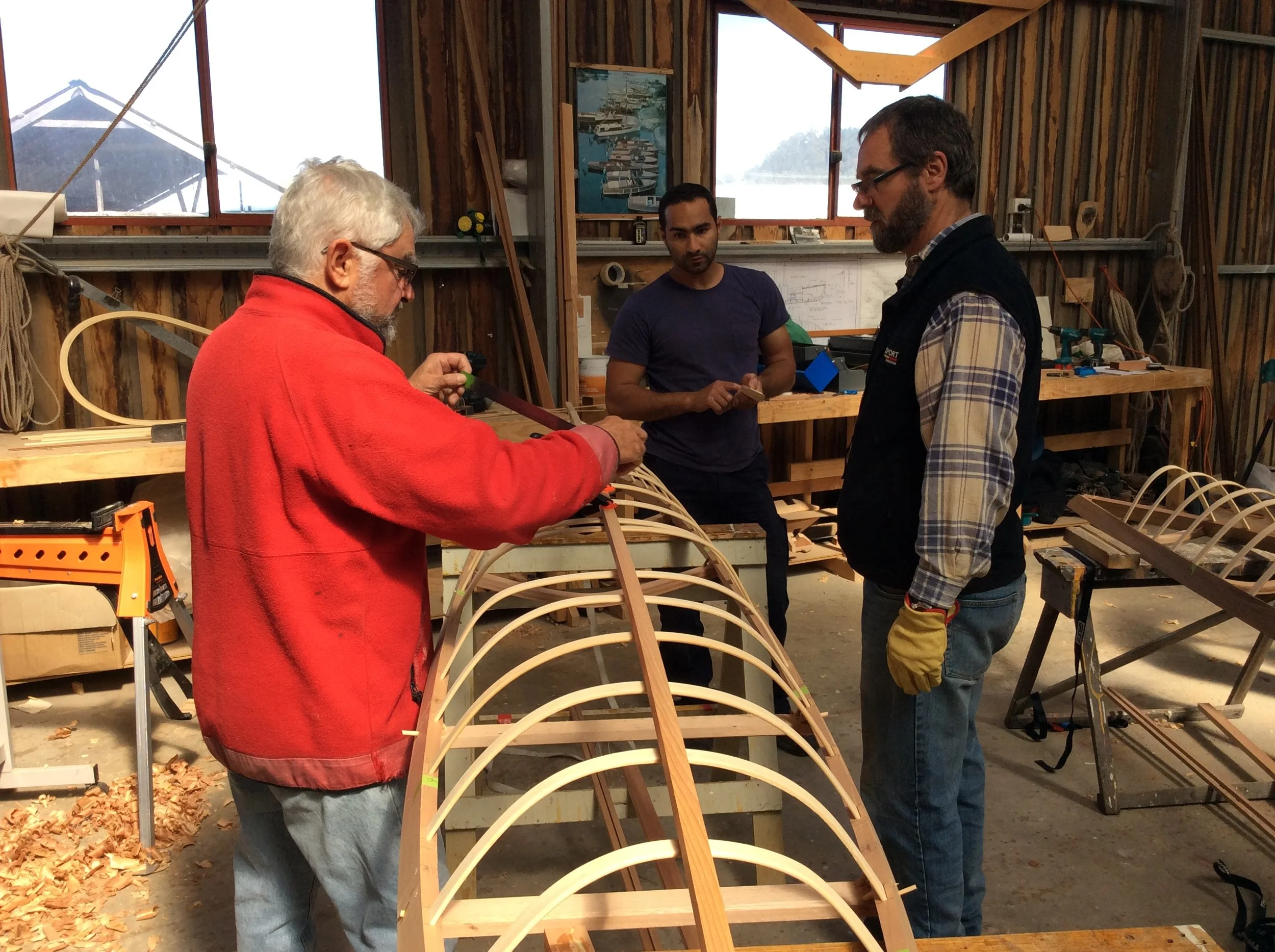 John Walduck making his skin on frame kayak