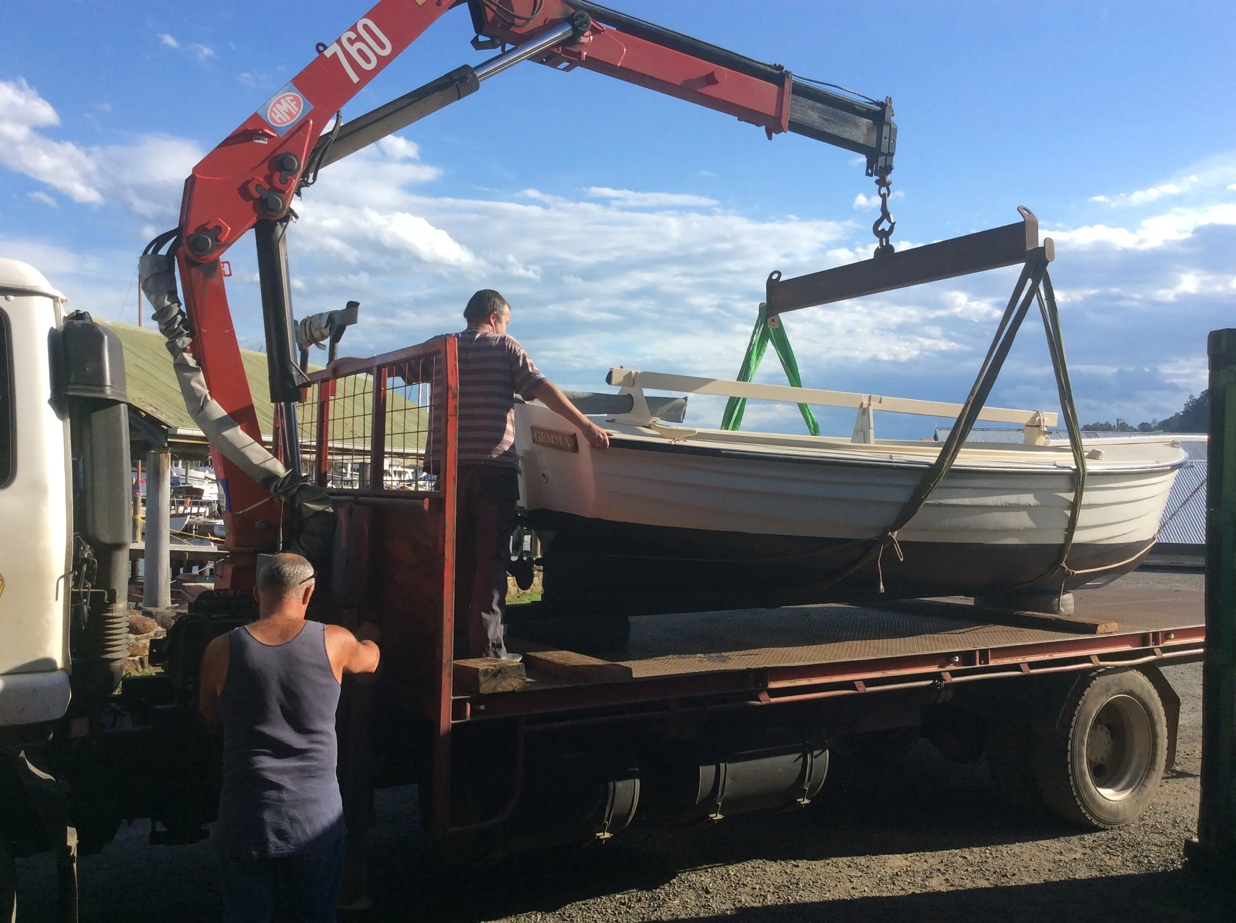 Hayden putting Gemma back in the water after repairs