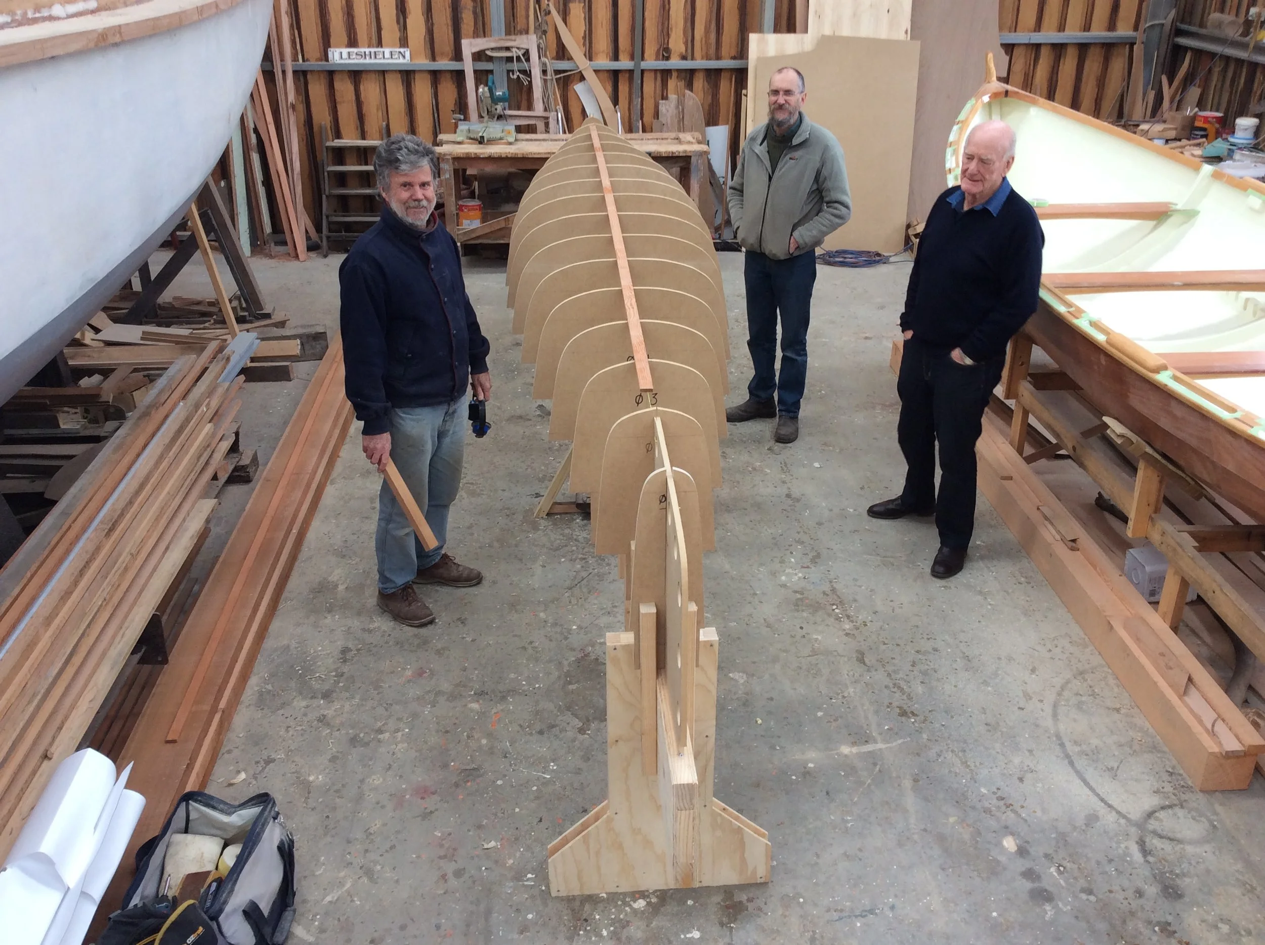 Peter, Peter and Ian discussing the build of the 2 Peter's strip planked canoe