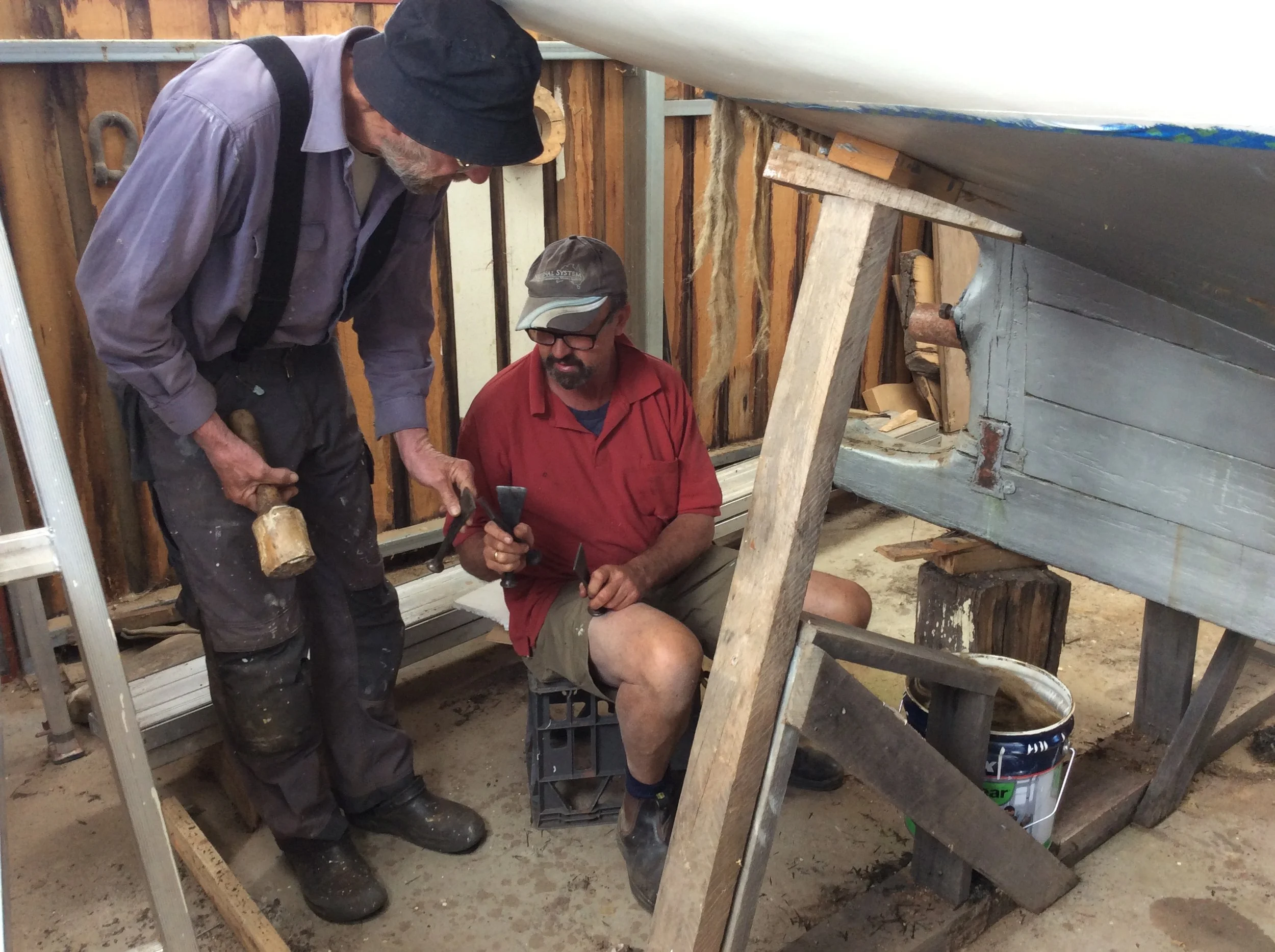 Discussing caulking tools.JPG