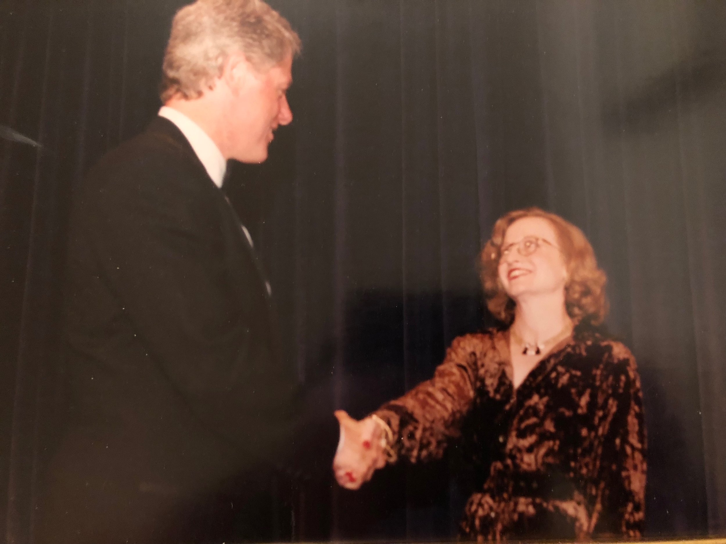 MelilloReceivingAwardFromClinton.jpg