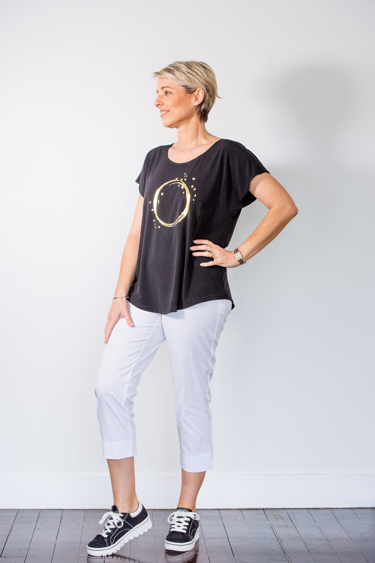 The gold circle top