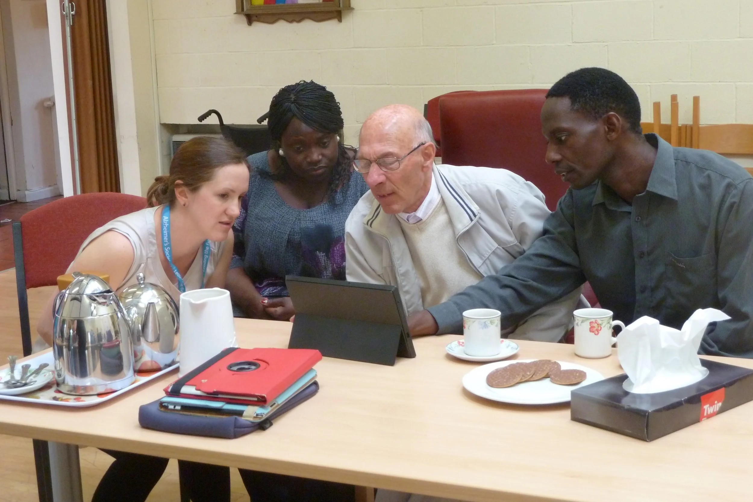 Participants engaging with touchscreen activities (1)