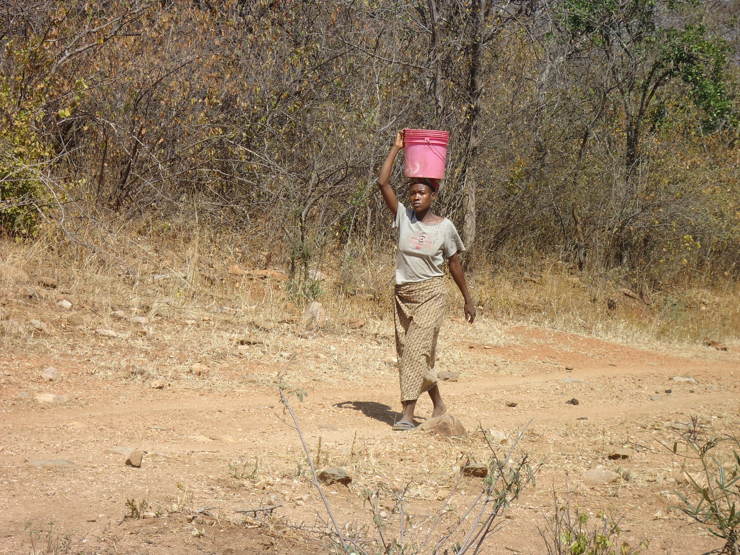 Woman carrying water.JPG