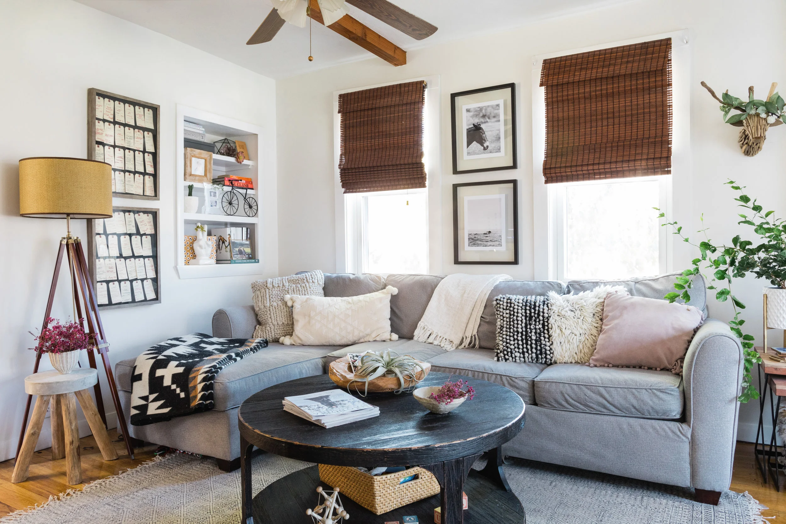 coffee table / tripod lamp / pendleton blanket { similar } / couch { similar } / rug / driftwood stag { similar } / driftwood garland { similar } / knit pillow { similar } / linen throw / stool { similar }
