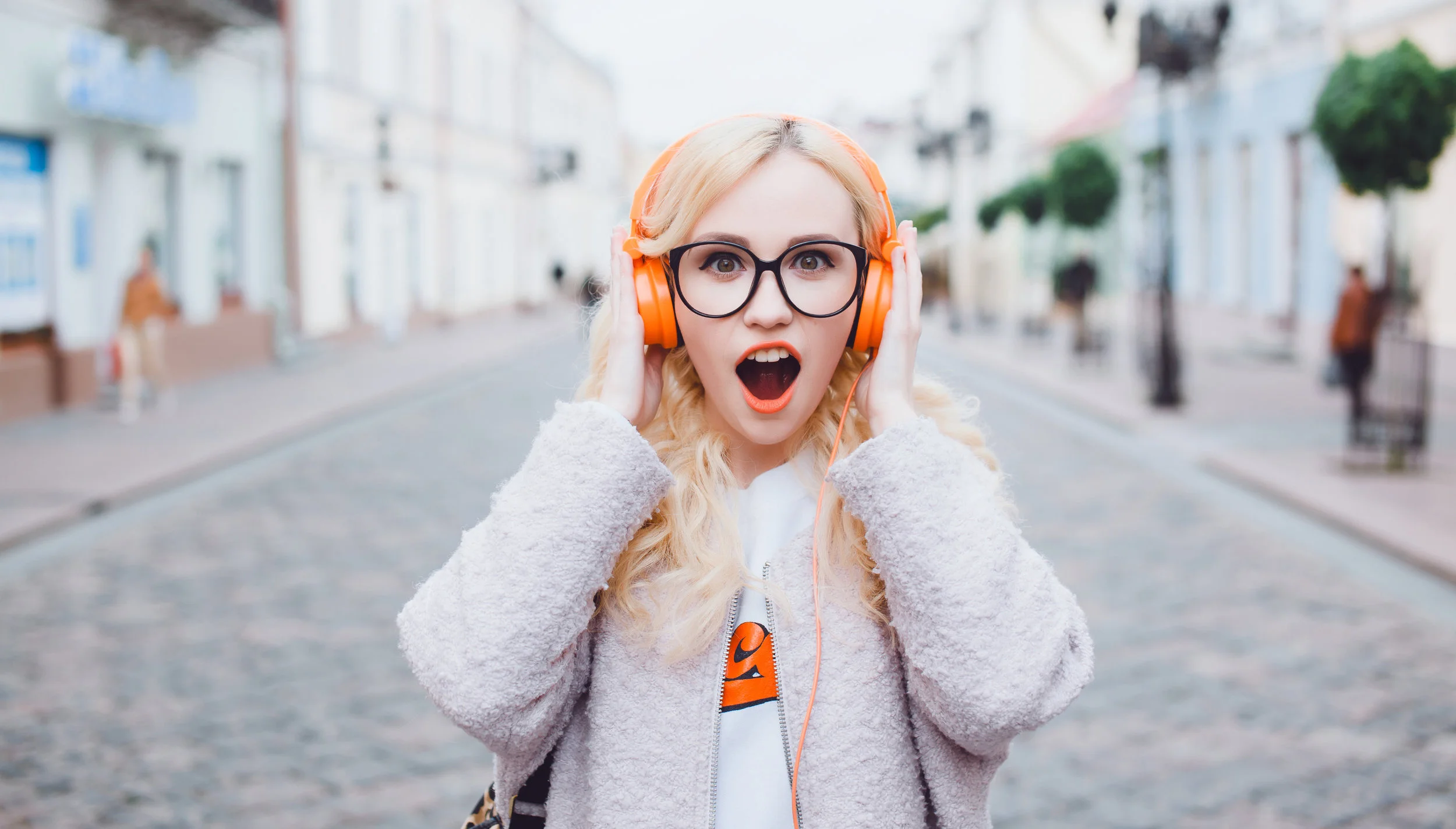 young girl listening music in headphones urban street style 4000px 422112550.jpg