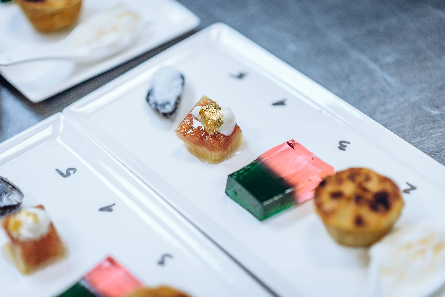 Five futures: jellyfish buttermilk granita, mini apple pie, his 'n' hers jelly, honeycomb gold leaf fig, salt crystal shell. Photo by Steven Acres