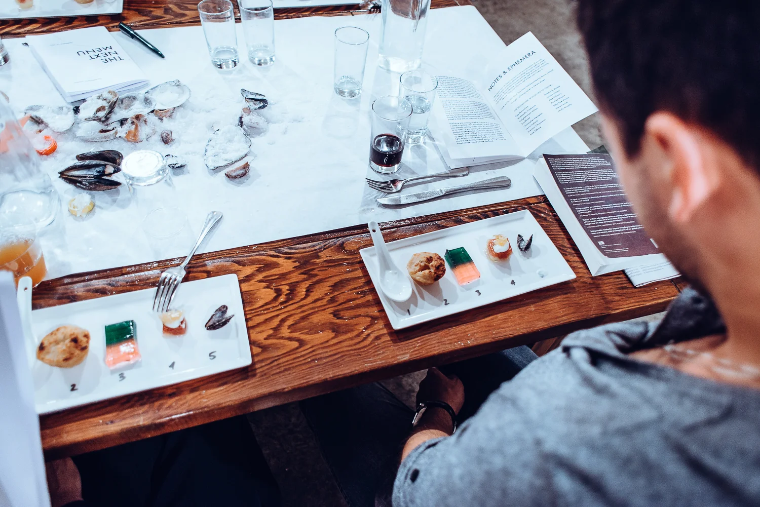 Five futures: jellyfish buttermilk granita, mini apple pie, his 'n' hers jelly, honeycomb gold leaf fig, salt crystal shell. Photo by Steven Acres