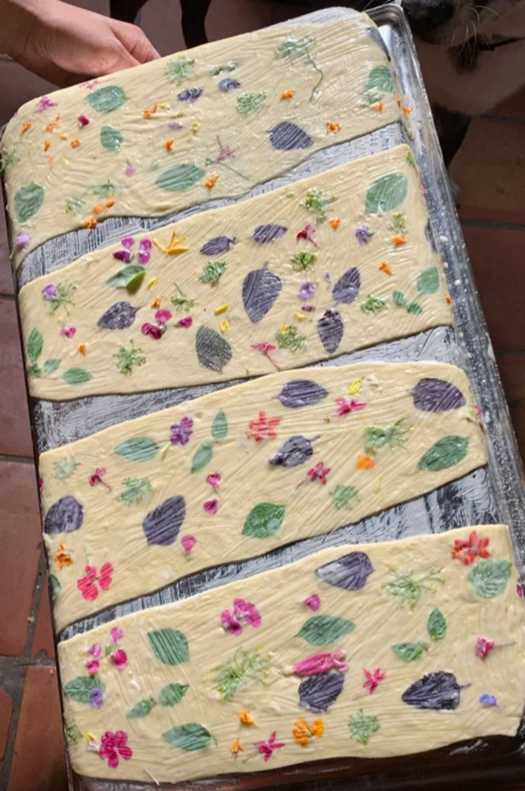  Herb and flower-pressed lavash going into the oven. Photo by Robin Rose Hilleary. 