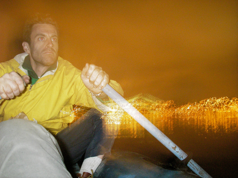 So I rowed down the river at night.