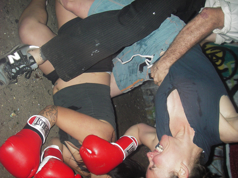Twazon struggles to deflect Lorenz's merciless blows.