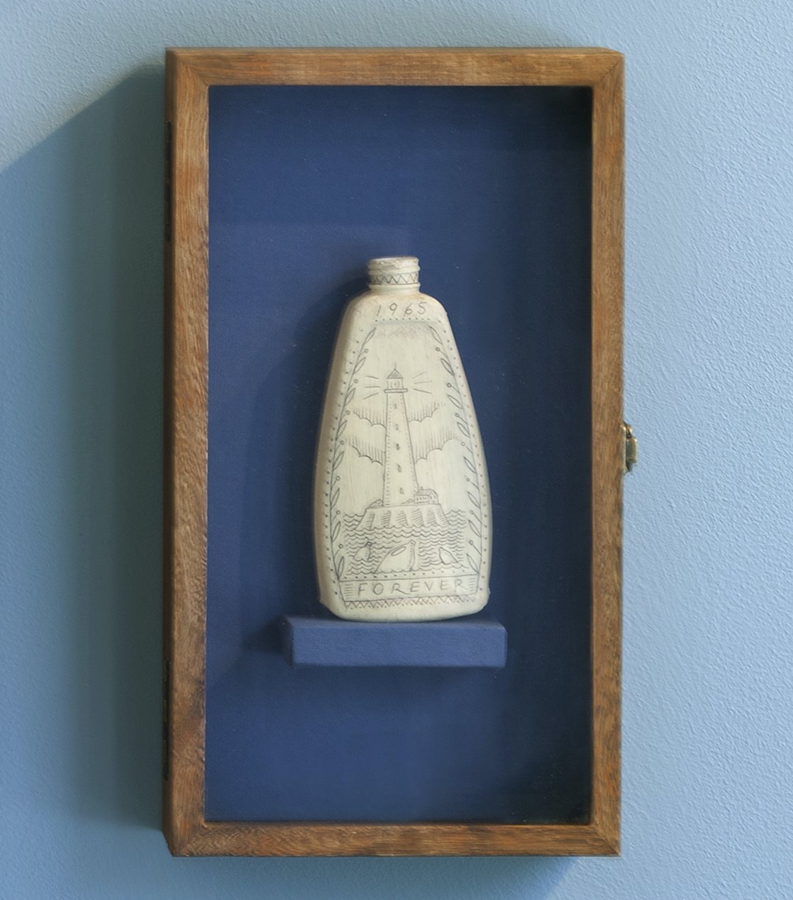   No. 18 of the Poly S. Tyrene Memorial Maritime Museum , 2020, Reclaimed ocean plastic, ink, wax in wood &amp; glass case, 14.88” x 8.5” x 2.75". Photo courtesy of Will Howcroft for Praise Shadows Art Gallery. 