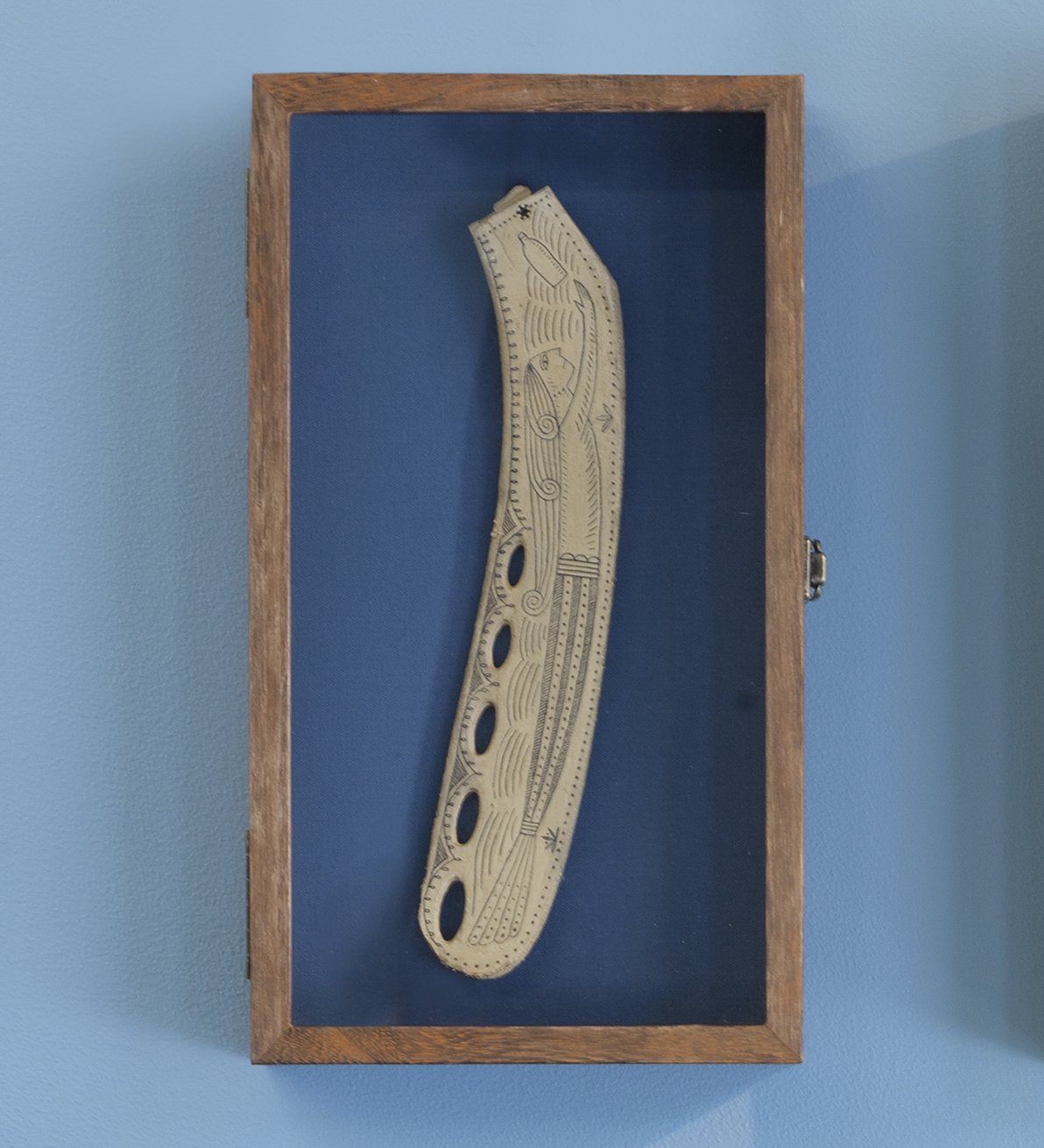   No. 1965 of the Poly S. Tyrene Memorial Maritime Museum , 2020, Reclaimed ocean plastic, ink, wax in wood &amp; glass case, 14.88” x 8.5” x 2.75". Photo courtesy of Will Howcroft for Praise Shadows Art Gallery. 