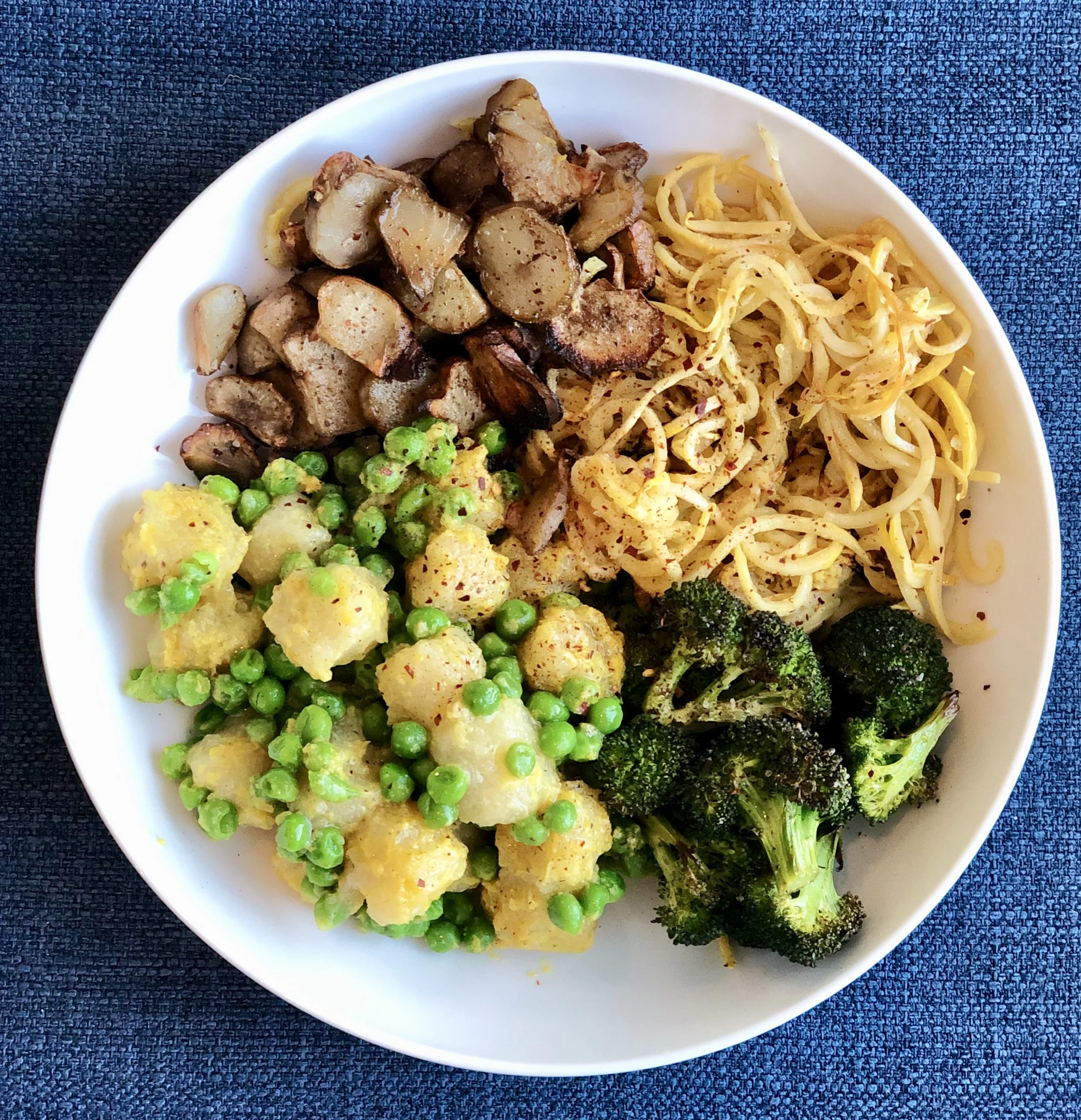 Cauliflower Gnocchi with sweet peas- sunchokes- broccoli and zucchini.jpg
