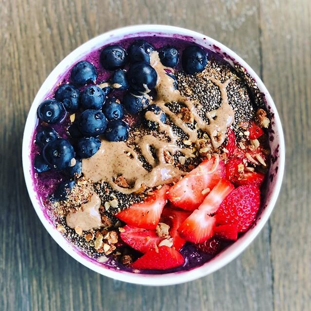 Good morning! Pure happiness and sunshine in a bowl.

Ingredients:
Frozen strawberries
wild blueberries
blackberries
raspberries 
blended with plain coconut yogurt
unsweetened almond milk and raw honey.

Topped with sliced strawberries
blueberries
gr