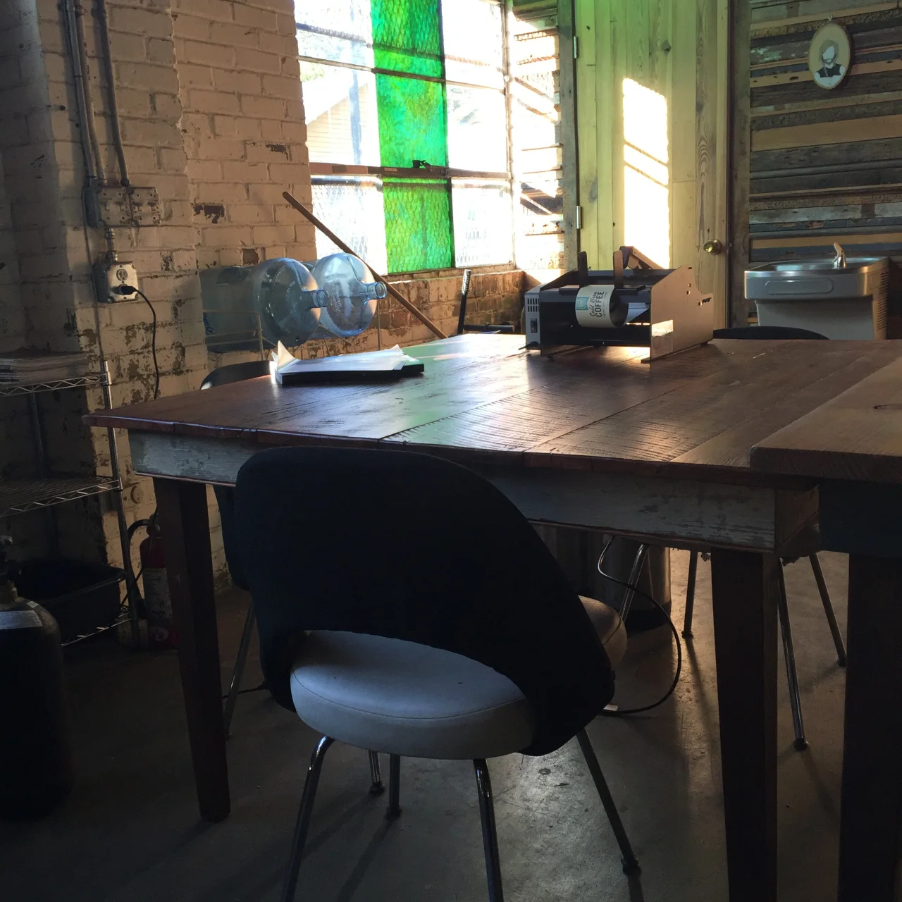 Another view of the same table. The skirt is made of painted porch wood, also reclaimed heart pine, from a house built in the Victorian era. 