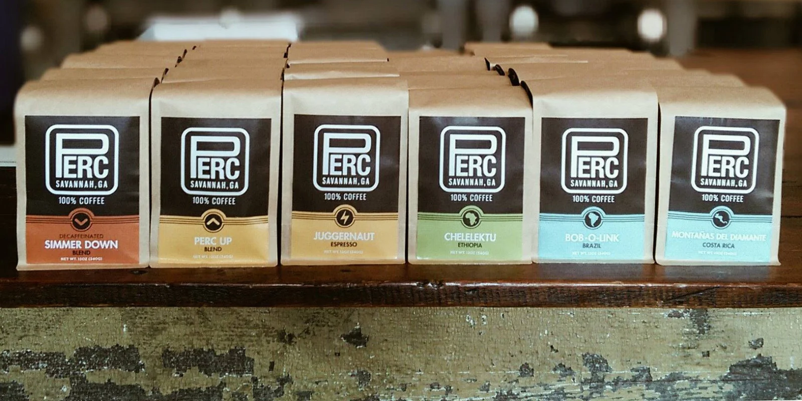 Perc's quite international array of beans, situated on our reclaimed heart pine table top, with an antique Victorian porch wood skirt. Photo from an interesting article at The Local Palate . 