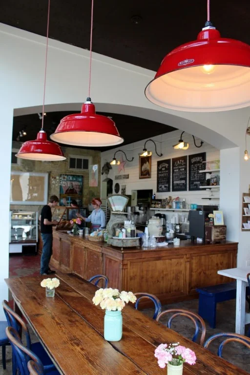 Photo courtesy of Barnlight Electric , who provided these wonderful industrial shades. 